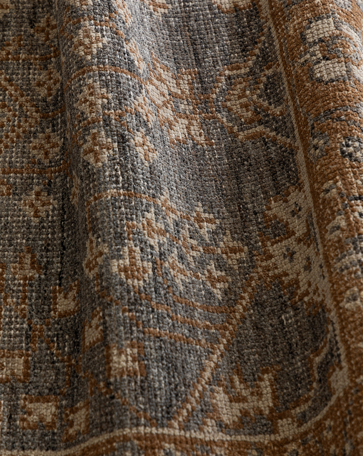 Gentle folds reveal its thick, textured wool and artisan craftsmanship inspired by traditional textiles, by McGee & Co.