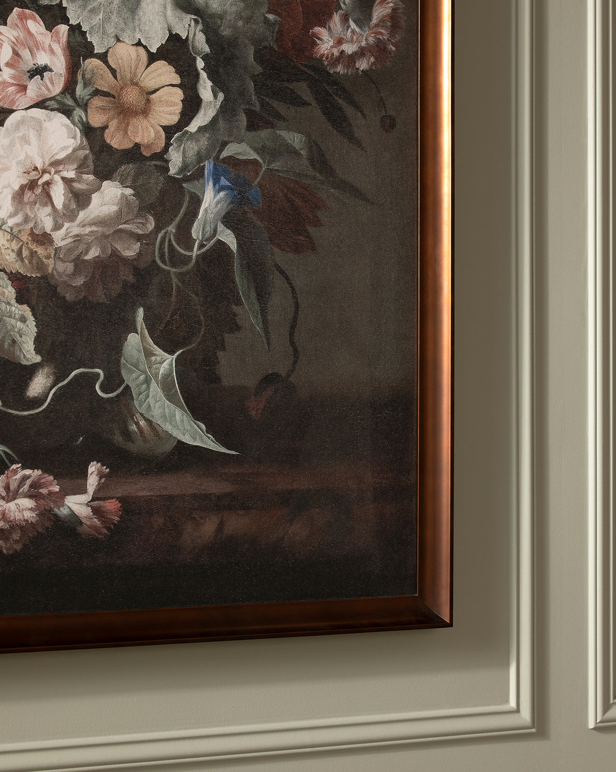 Close-up of Botanical Renaissance, a classic floral painting featuring detailed flowers and leaves in muted tones, showcased in a bronze-finished frame on an ornately paneled beige wall.