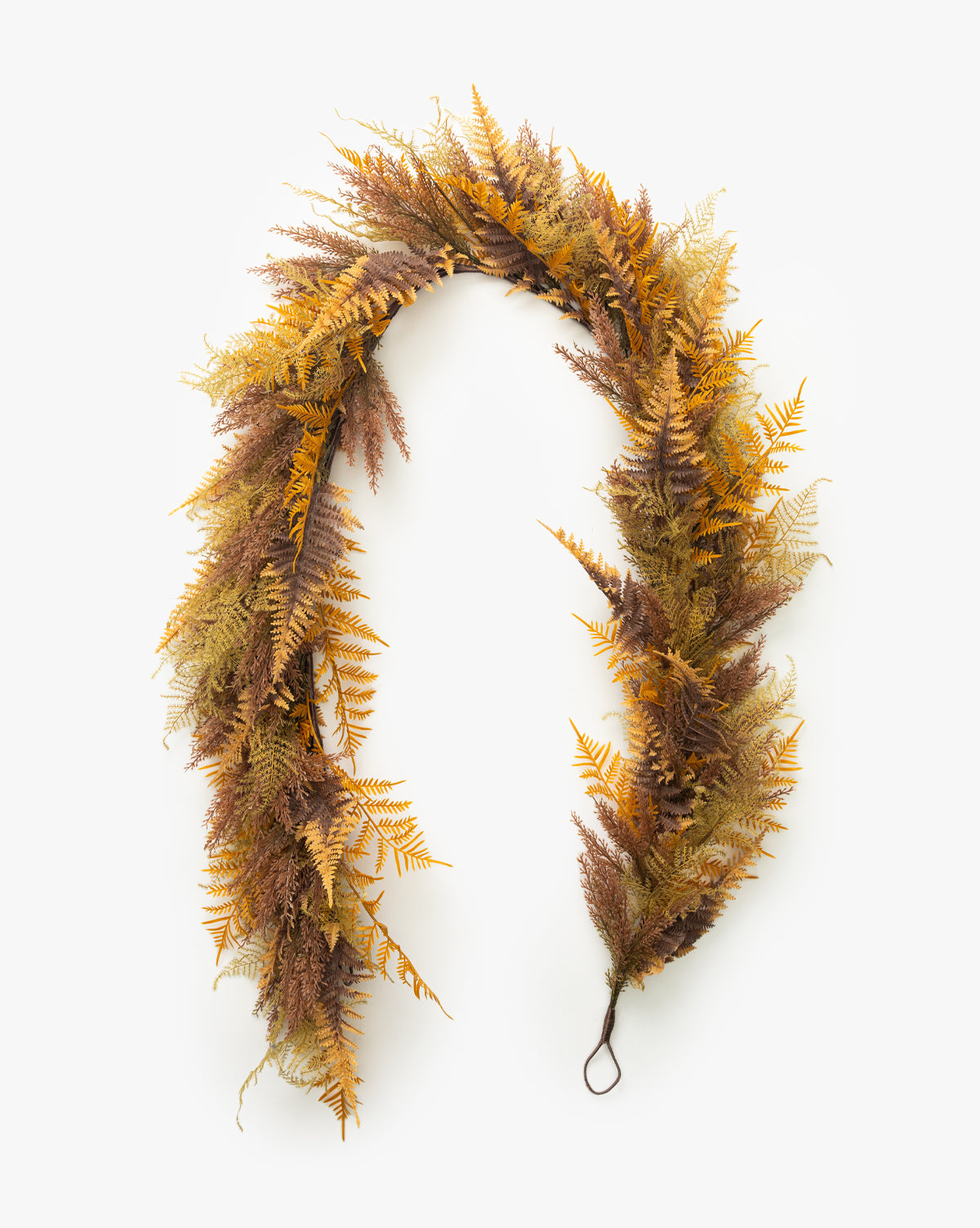 The 6 Faux Golden Fern Garland features amber and golden artificial ferns in yellow, brown, and green, arranged in a curved shape with a loop—ideal for autumn décor against a plain white background by McGee & Co.