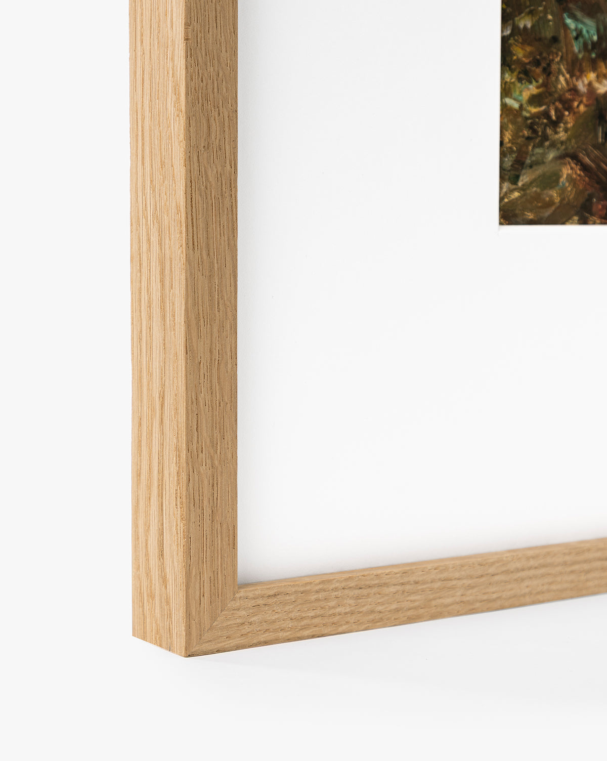 Close-up of the corner of a light wood frame featuring A River Runs Through, an abstract landscape in earthy tones—ideal for adding elegant wall art to your space, by McGee & Co.