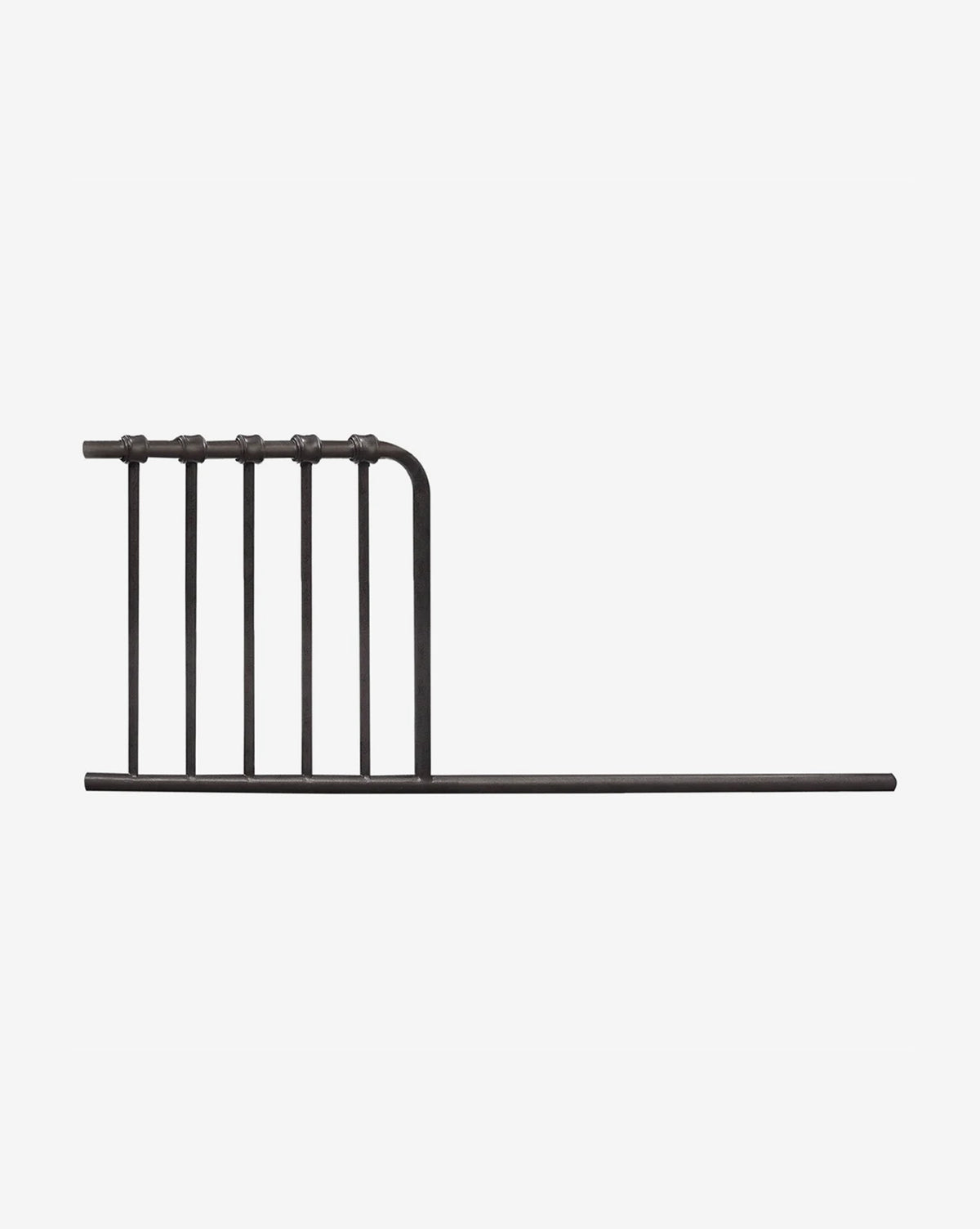 The Abigail Mini Crib 3-1 Conversion Kit by Million Dollar Baby features a dark, classic metal rail with vertical bars and a horizontal support for added safety, evoking vintage crib style against a plain white background. McGee & Co.