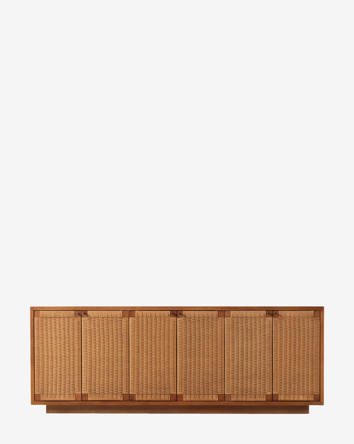 The Ackerman Sideboard by Four Hands features six doors with woven rattan and mahogany veneer, combining minimalist design and natural textures against a plain white background by McGee & Co.