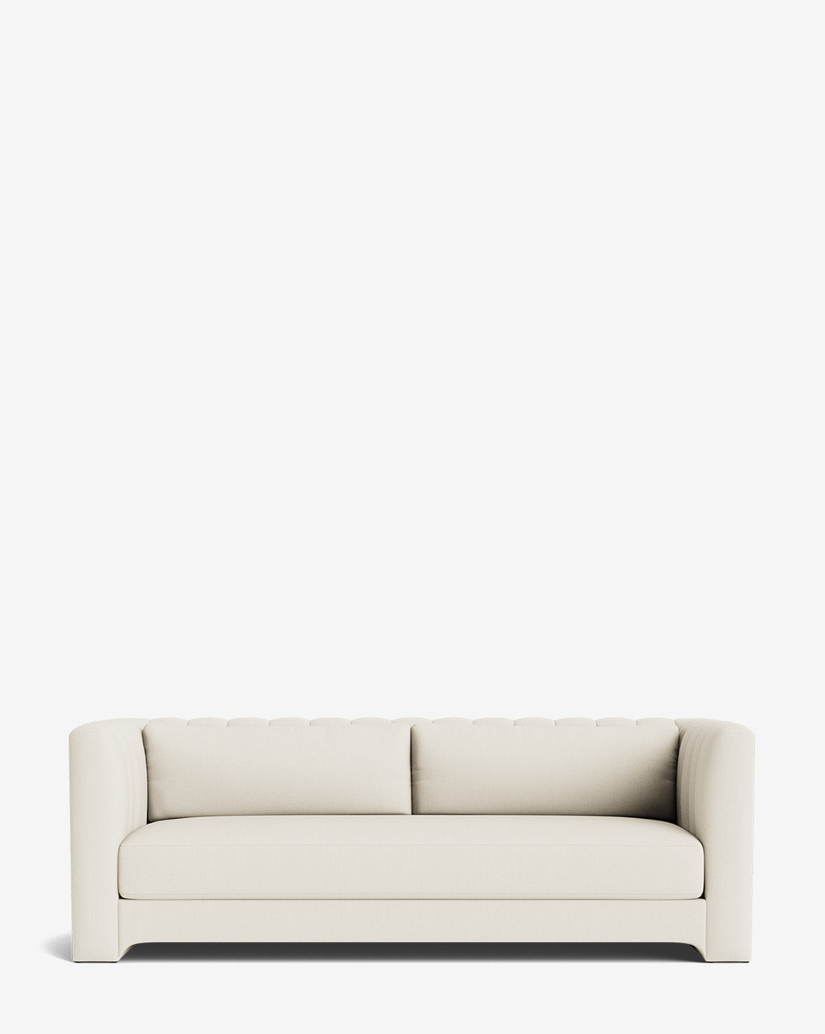 The Agatha Sofa 90 is a modern, cream-colored, handcrafted sofa with a low back, straight arms, and two matching back cushions, shown against a plain white background by McGee & Co.
