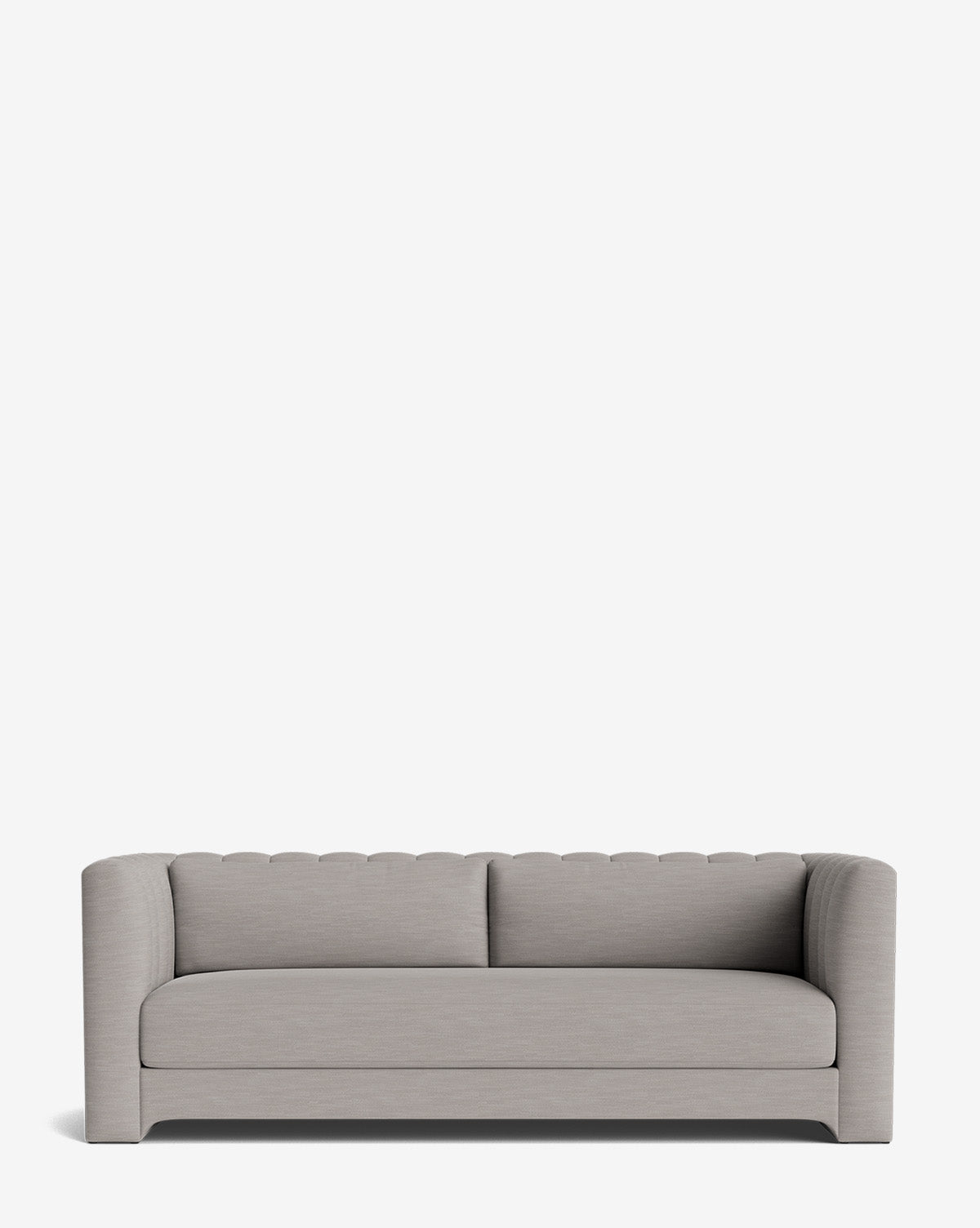 A modern light gray Agatha Sofa 90 with a low backrest, slightly curved armrests, and a sleek, minimalistic design. Firm, seamless cushions enhance this handcrafted sofa, shown against a plain white background by McGee & Co.