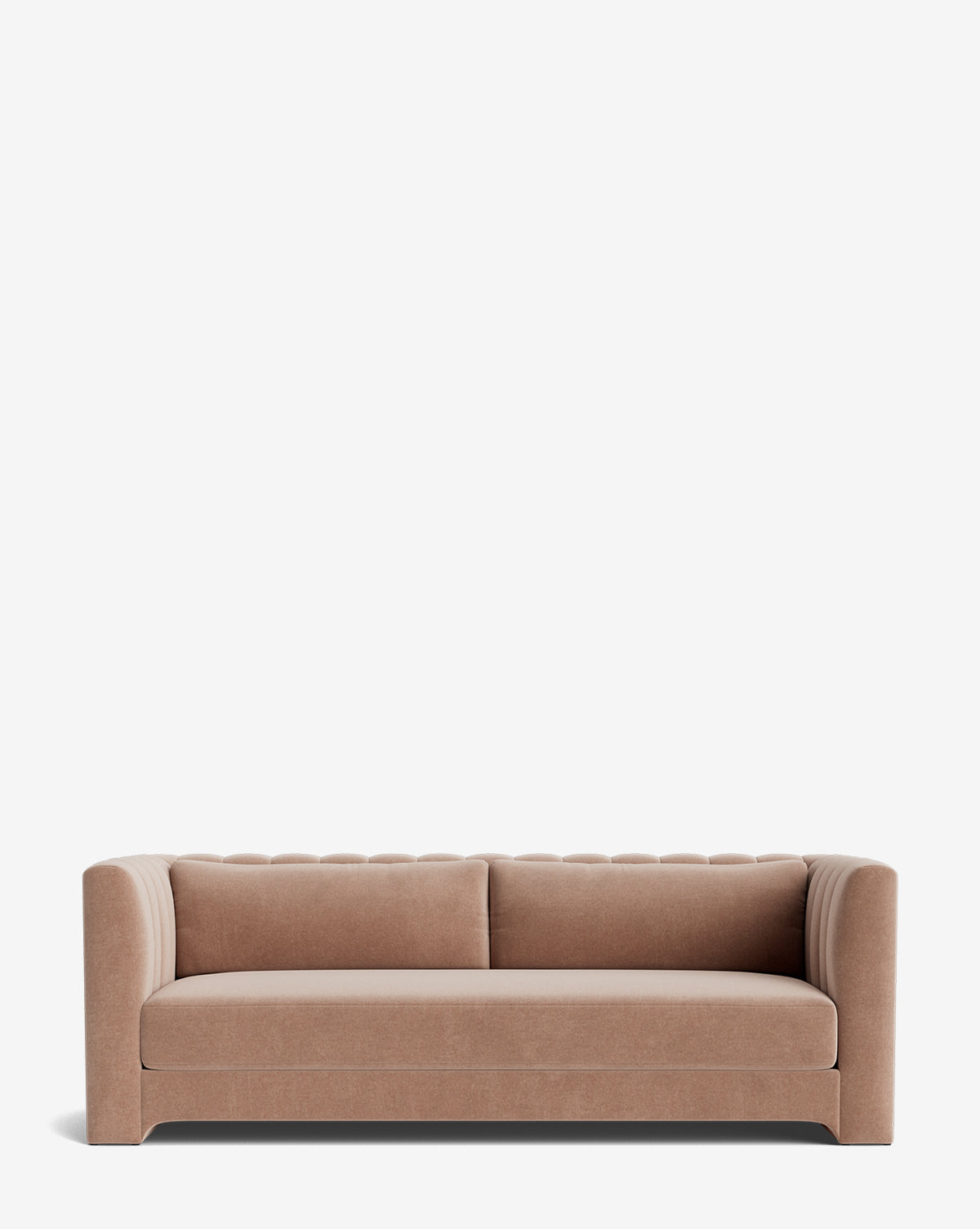 The Agatha Sofa 90 is a modern light brown upholstered sofa with a low back and sides, vertical tufting, and clean lines, inspired by Hollywood regency style, shown against a plain white background by McGee & Co.