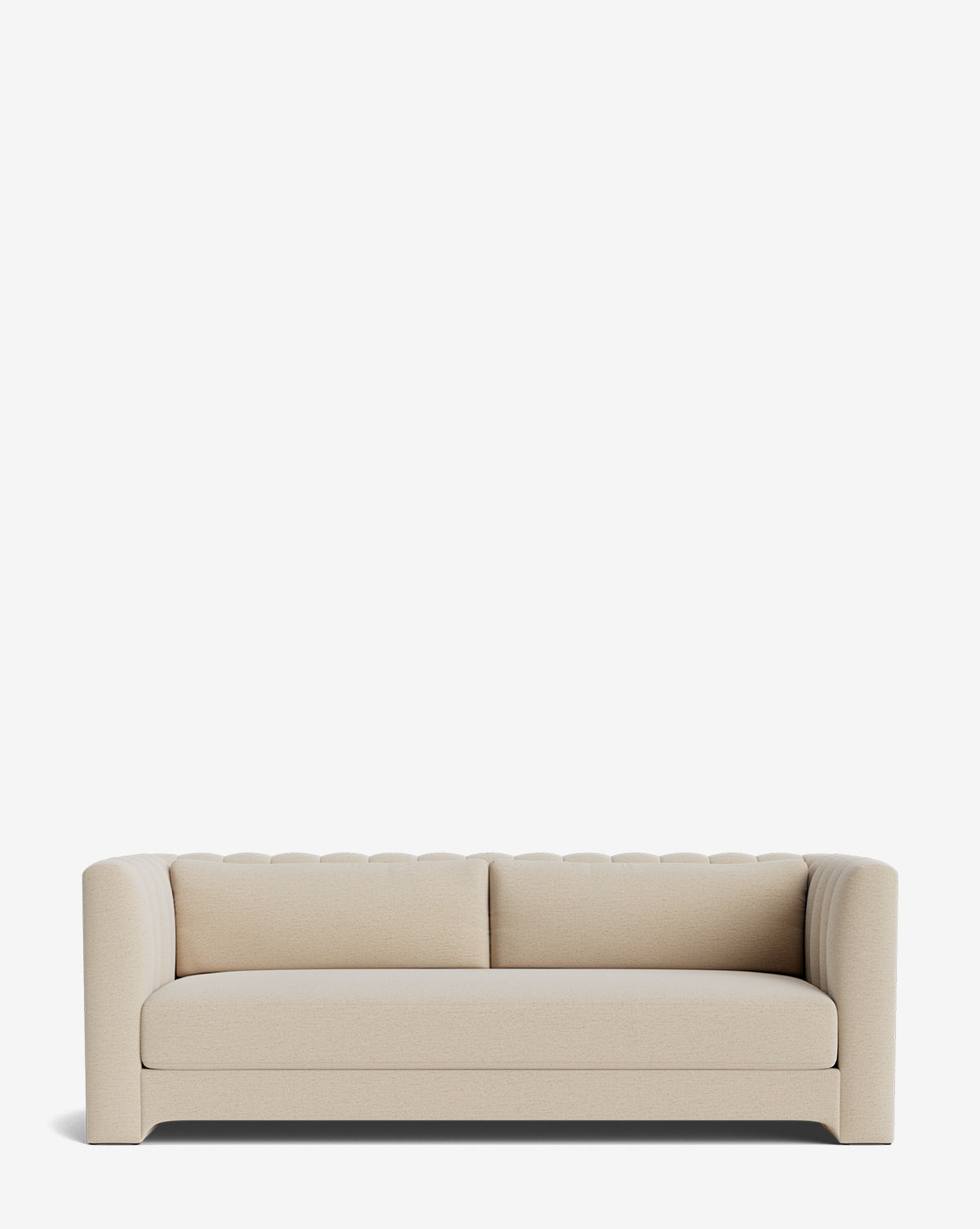 The Agatha Sofa 90 is a modern, cream-colored, handcrafted sofa featuring a low back, cushioned seat, and rounded armrests, set against a plain white background by McGee & Co.