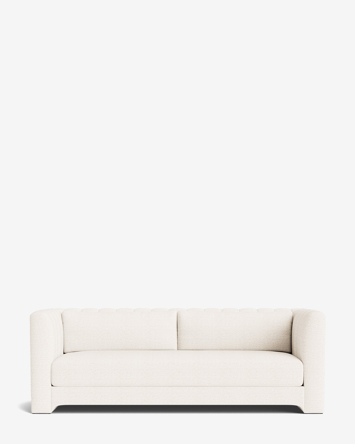 The Agatha Sofa 90 is a modern white upholstered piece featuring a low back and arms, tufted backrest detailing, and a clean minimalist design, shown against a plain white background by McGee & Co.