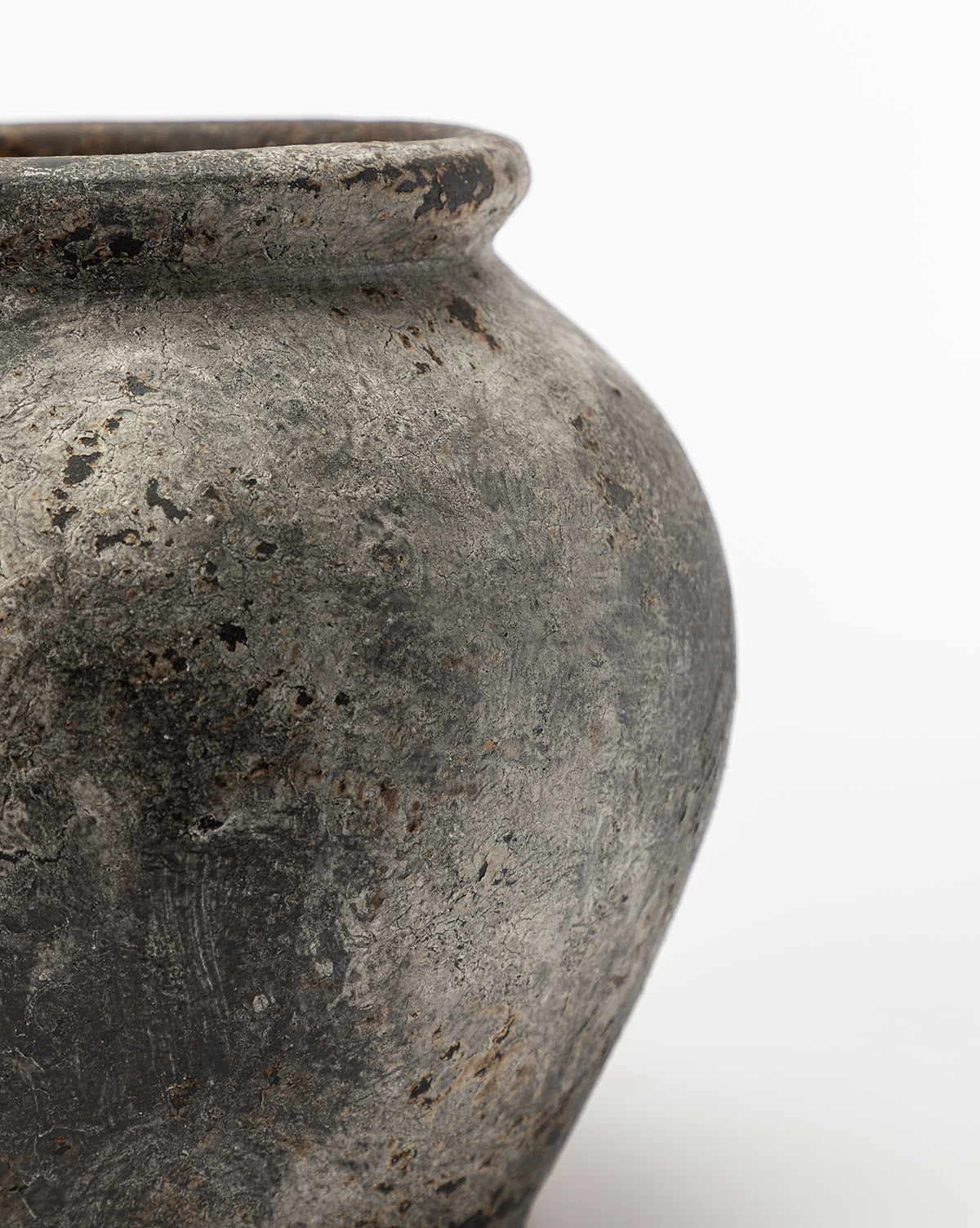 Close-up of the Aged Terracotta Jar with a weathered, textured surface and wide rim, ideal as a decorative vase or home decor accent against a plain white background.