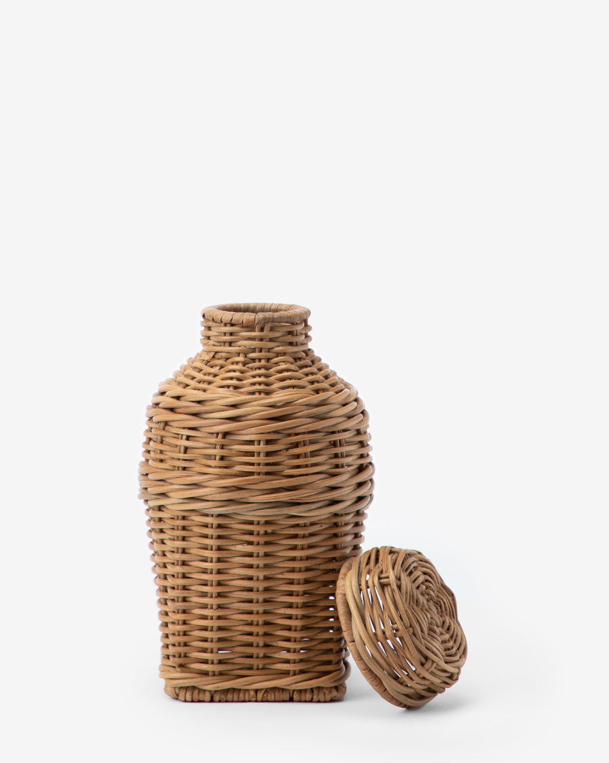 The Ahnamia Wicker Jar and its matching round lid are displayed side by side against a plain white background.