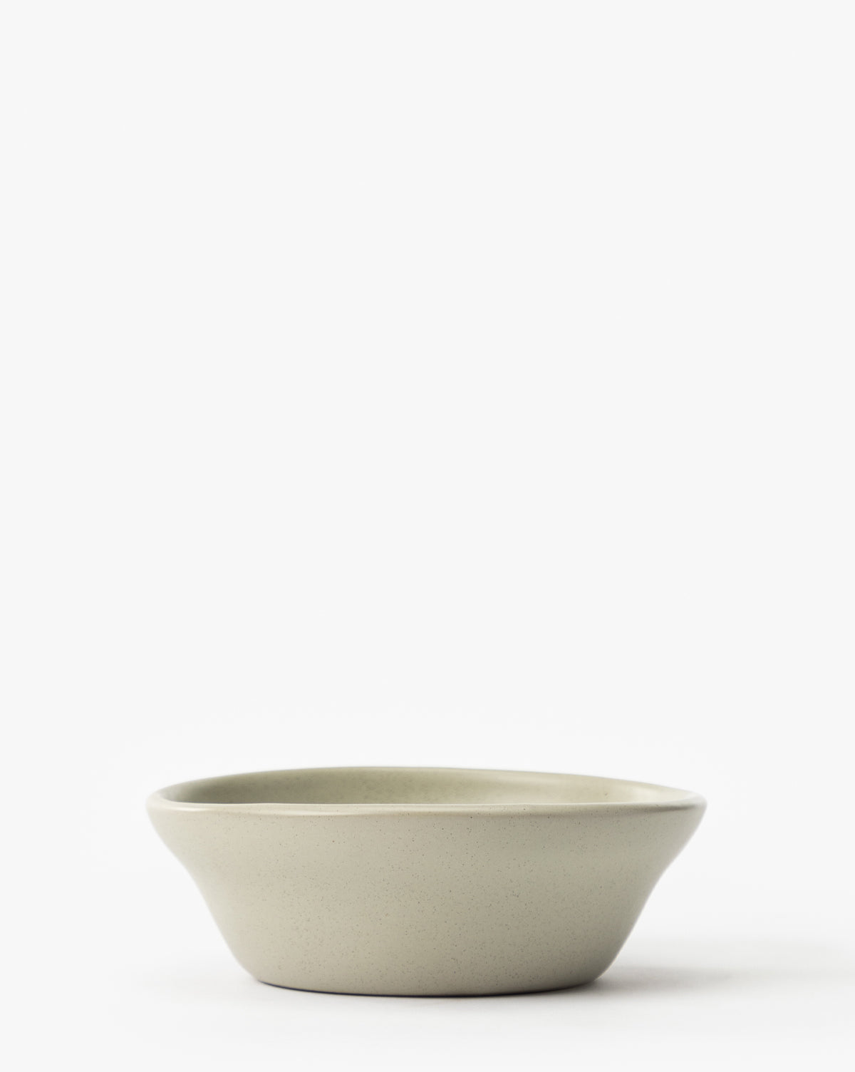 The Aiden Soft Gray Bowl features a classic round shape, soft gray glaze, and a wide rim, displayed on a white background, by McGee & Co.