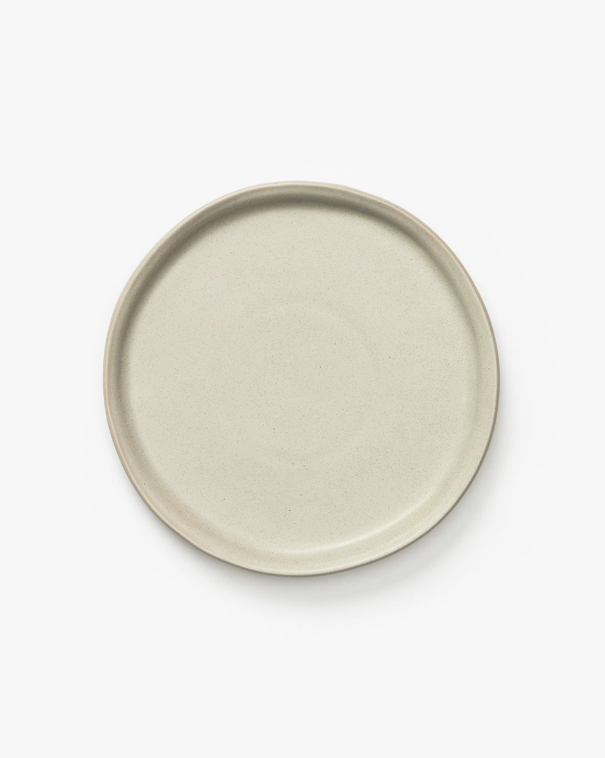 The Aiden Soft Gray Side Plate is a classic round ceramic plate in soft gray with a slightly raised rim, shown on a white background, by McGee & Co.