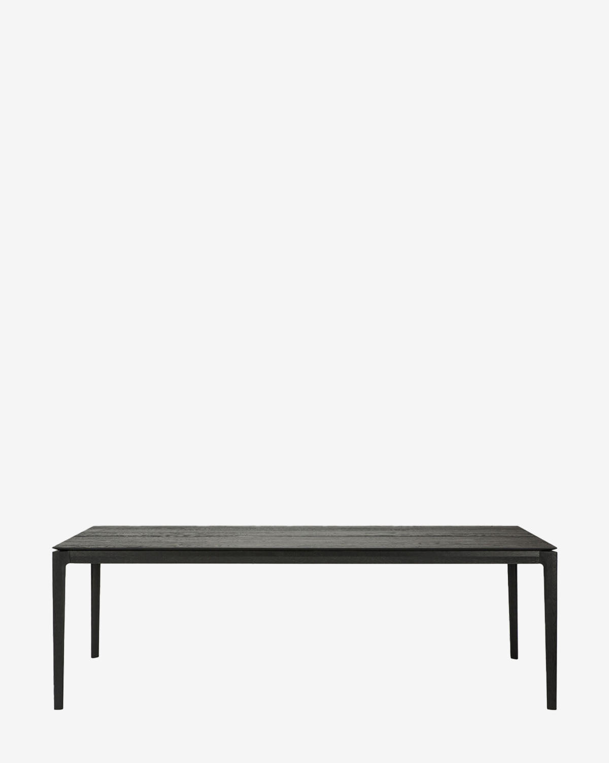 The Alec Dining Table features a minimalist black design with four slender legs, making it the ideal centerpiece to elevate any modern dining room, by McGee & Co.