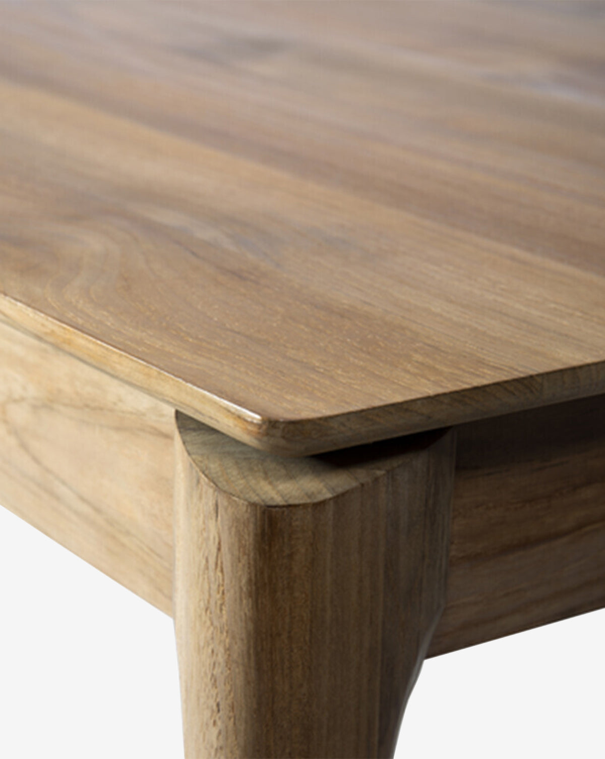 Close-up of the Alec Dining Table corner, showing its smooth natural wood grain, rounded edge, and sturdy build—ideal for any dining room, by McGee & Co.
