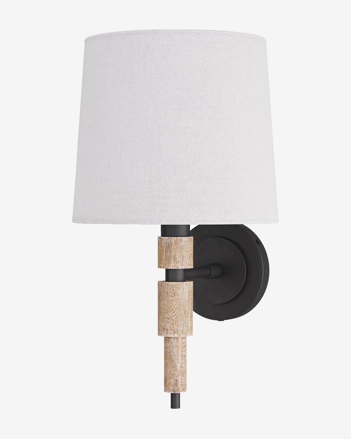 The Arteriors Allman Sconce showcases a white linen shade, black circular base, and layered wooden stem with natural texture, creating an elegant wall-mounted accent. McGee & Co.