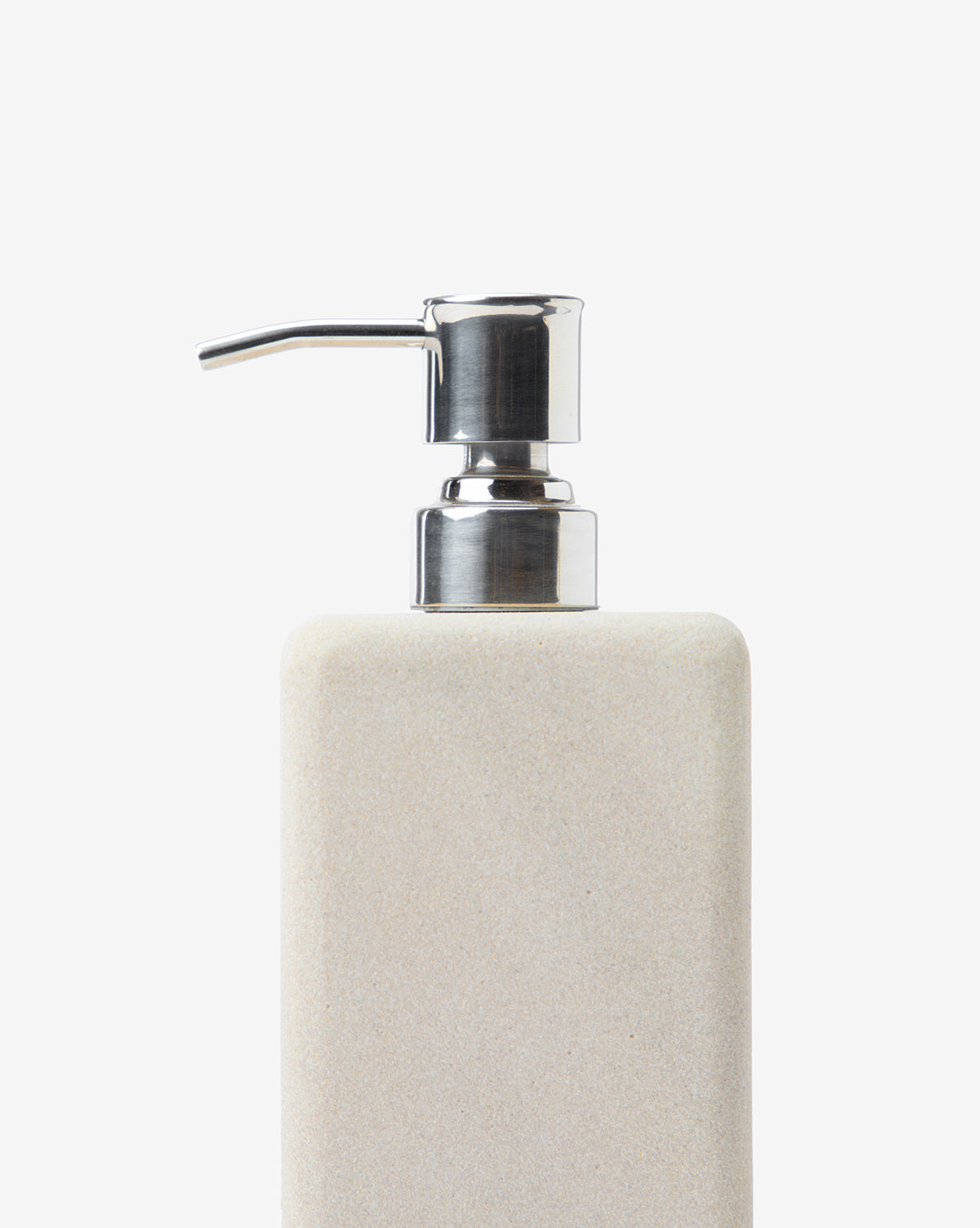 A close-up of the Amada Sandstone Bath Collection beige rectangular dispenser with a silver metal pump, adding an organic touch to your bathroom decor, set against a plain white background.