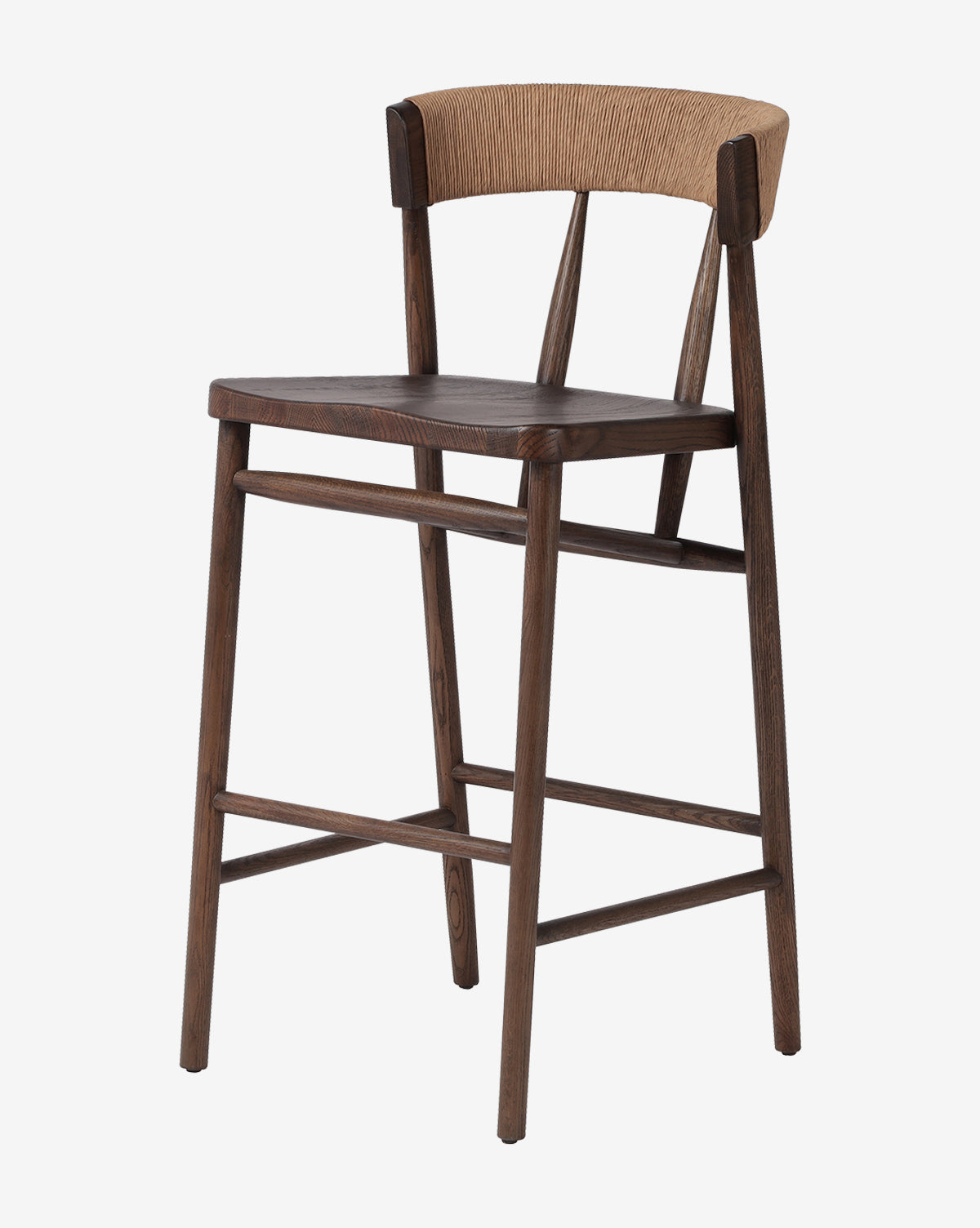 The Ardent Stool by Four Hands is a wooden bar stool with a solid oak frame, dark brown finish, flat seat, and curved backrest with woven cane—ideal for any kitchen bar. McGee & Co.