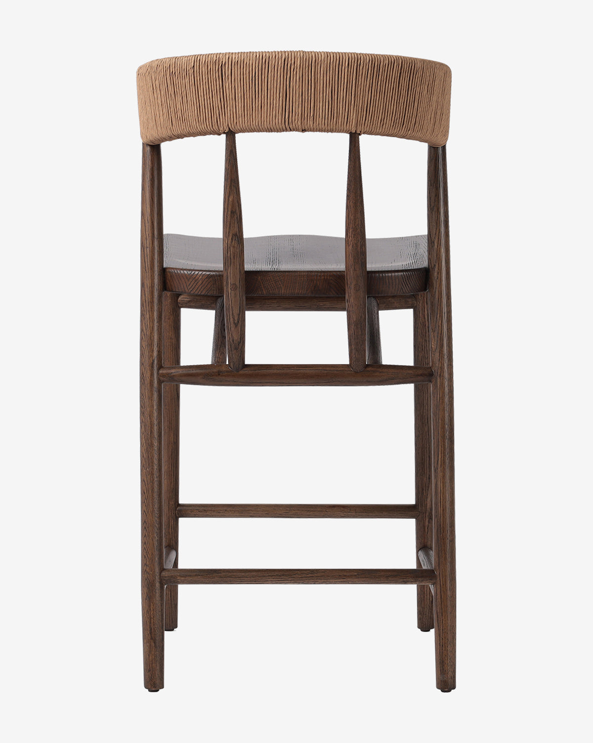 The Ardent Stool by Four Hands features an oak frame, dark brown legs, a woven natural paper rush backrest, and a smooth dark seat, shown from the back against a plain white background. McGee & Co.