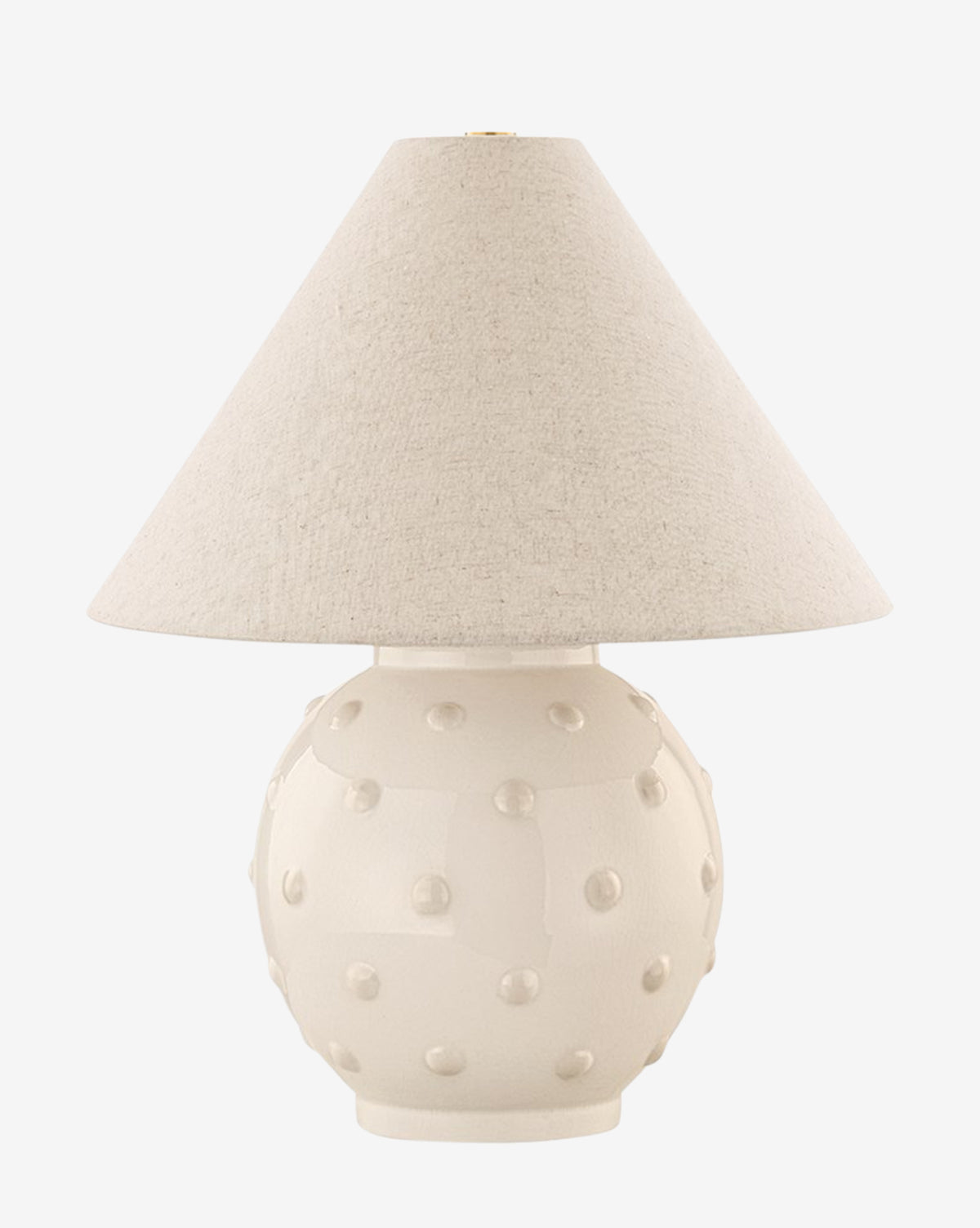 The Annabelle Table Lamp showcases a textured round white ceramic base with raised dots and a wide beige fabric shade, bringing handcrafted charm to any room by McGee & Co.