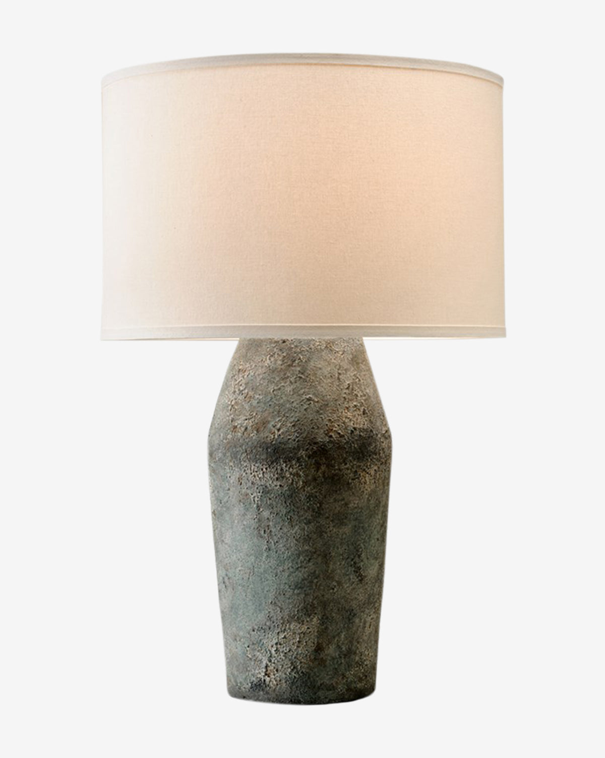 The Artifact Table Lamp showcases a moonstone-finished, textured gray base with a large, round off-white fabric shade, perfect for adding modern style to any space, by McGee & Co.