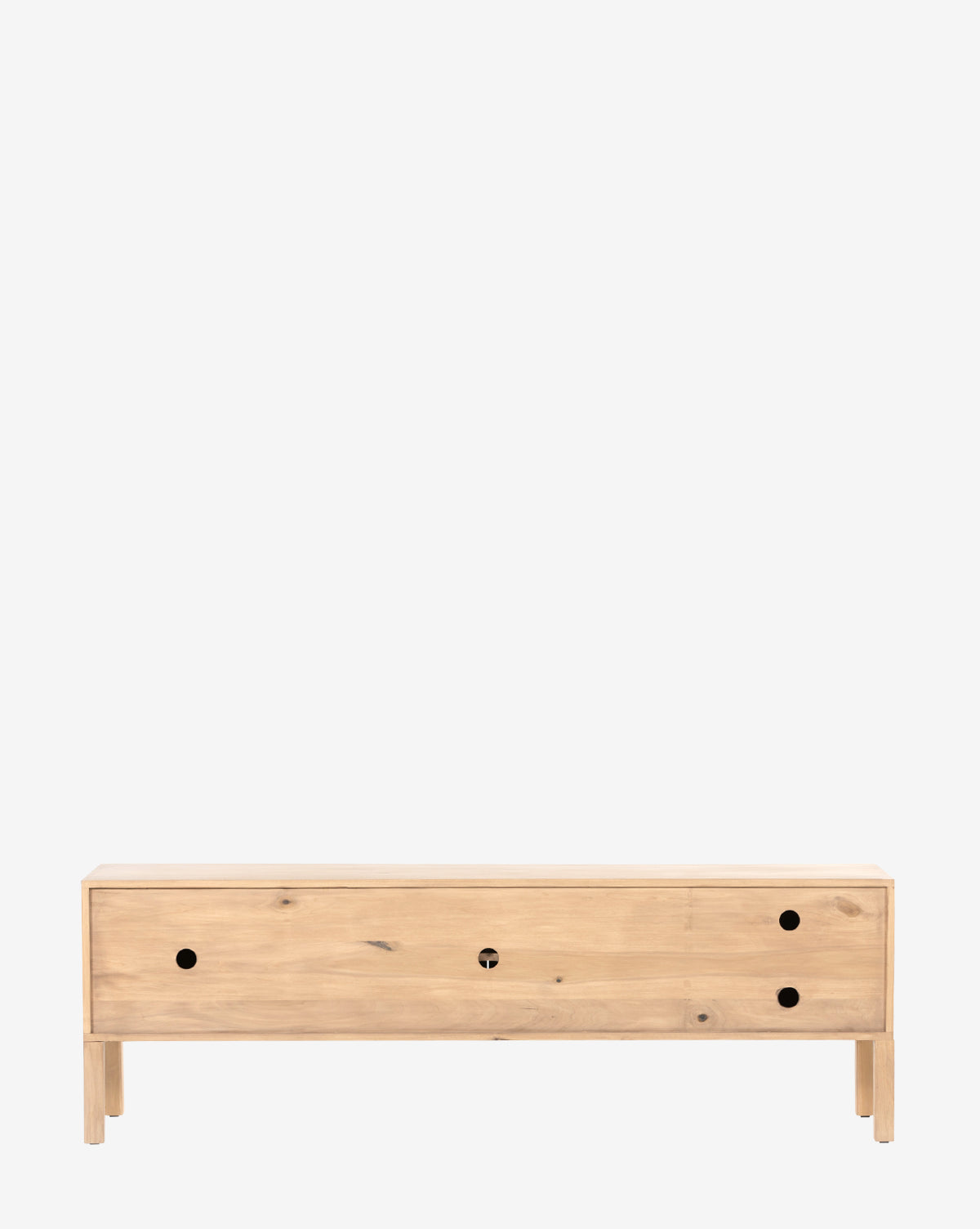 The Ashlen Console TV stand features a light wood finish, minimalist Shaker-inspired design, solid poplar build, long rectangular shape, four legs, a flat top, and three round cut-out handles on the front panel, by McGee & Co.