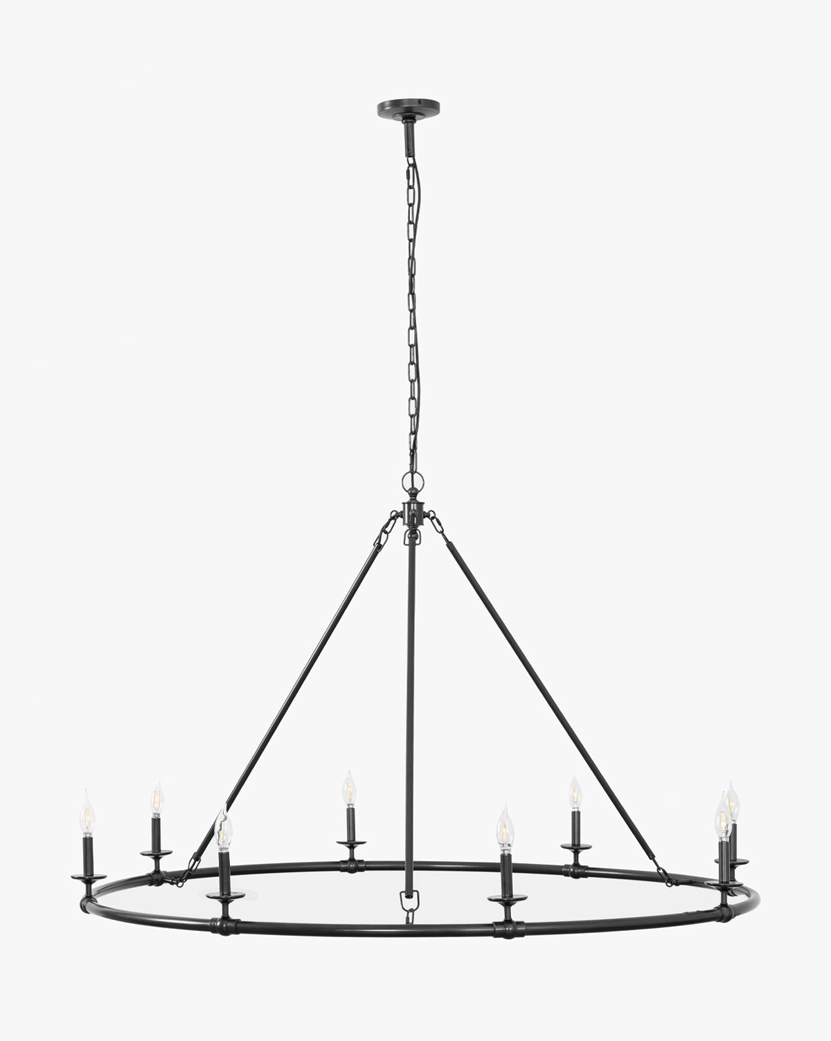 The Makerspalm Aurelia Ring Chandelier features a modern circular black metal frame with eight candle-style bulbs, suspended from the ceiling by chain and rods. McGee & Co.