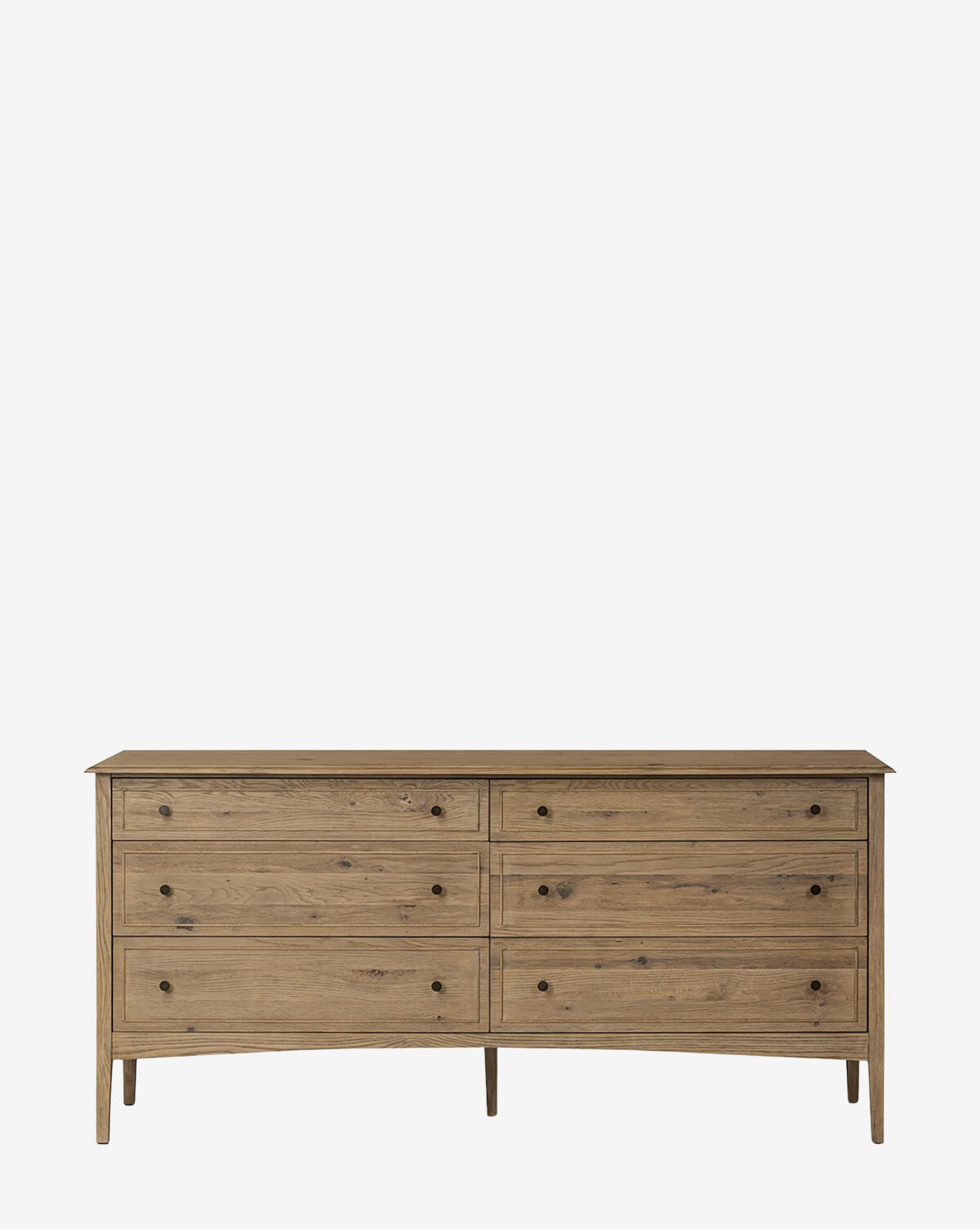 The Aurelian 6 Drawer Dresser features a smoked oak finish, natural accents, six spacious drawers in two rows, simple round knobs, and tapered legs for a sleek modern look with minimalist style, by McGee & Co.