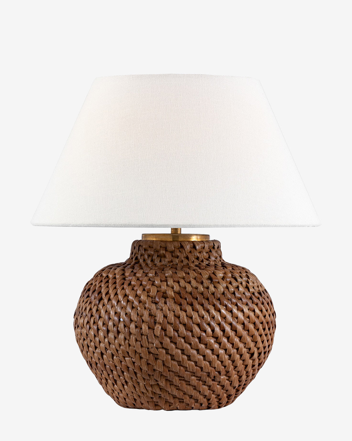 The Avedon Cordless Accent Lamp by Visual Comfort & Co. Signature features a woven natural rattan base and wide white fabric shade, creating a stylish accent against a plain white background. McGee & Co.