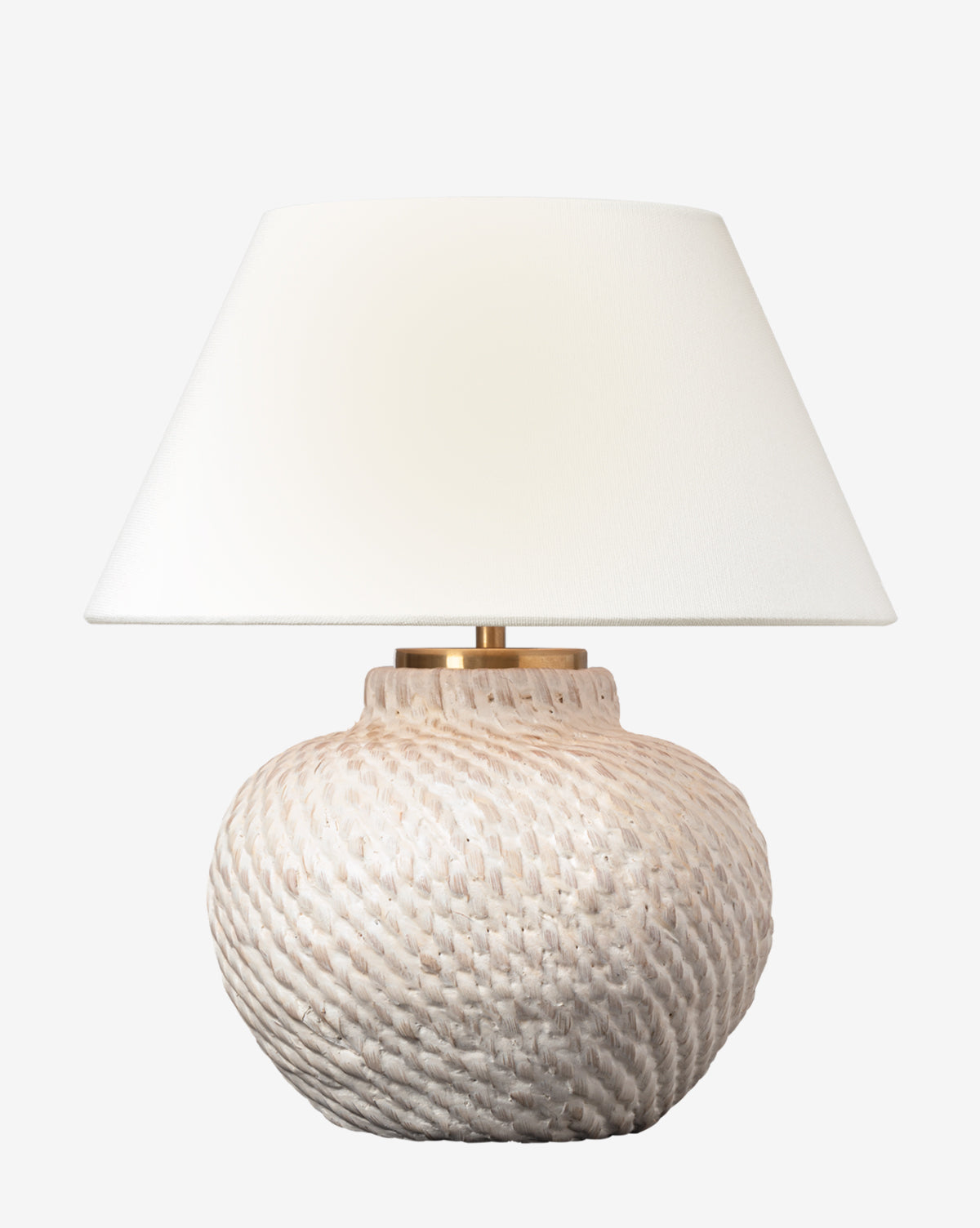 The Avedon Cordless Accent Lamp features a textured, round light beige ceramic base and a simple white lampshade, adding effortless style to any space with its cordless design, by McGee & Co.