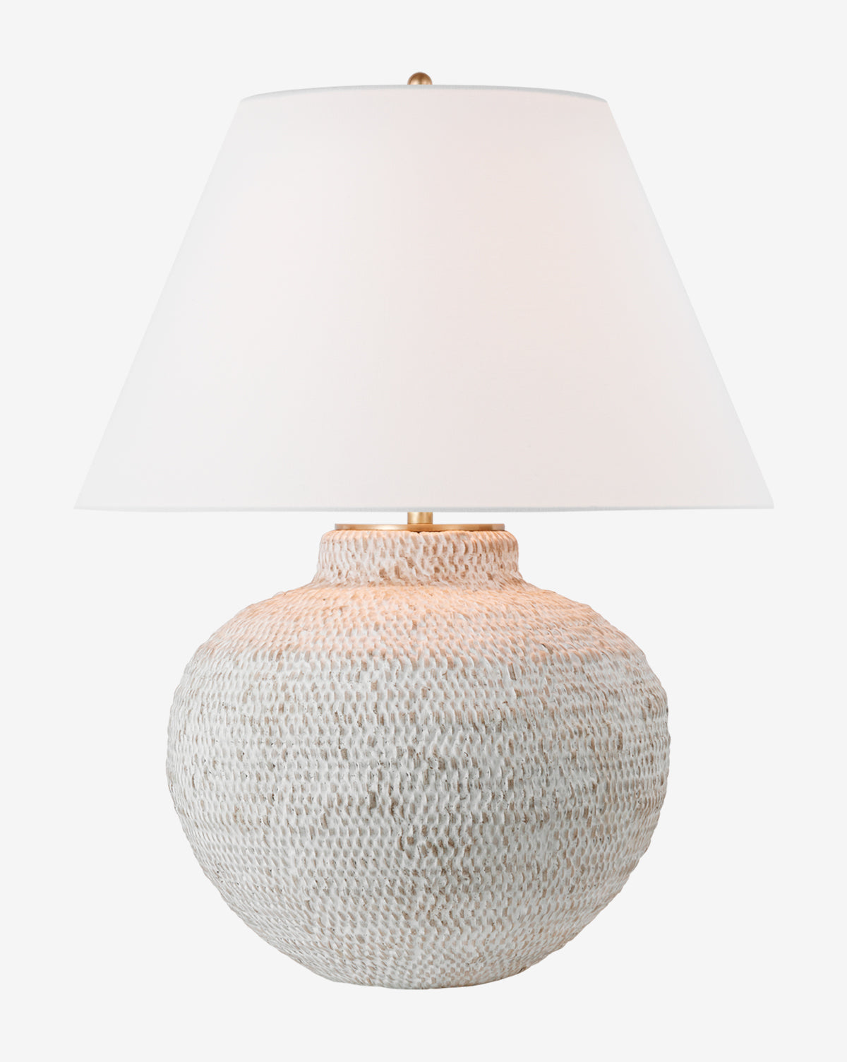 The Avedon Table Lamp showcases a round, textured white rattan base and a large white linen shade, displayed against a plain background by McGee & Co.