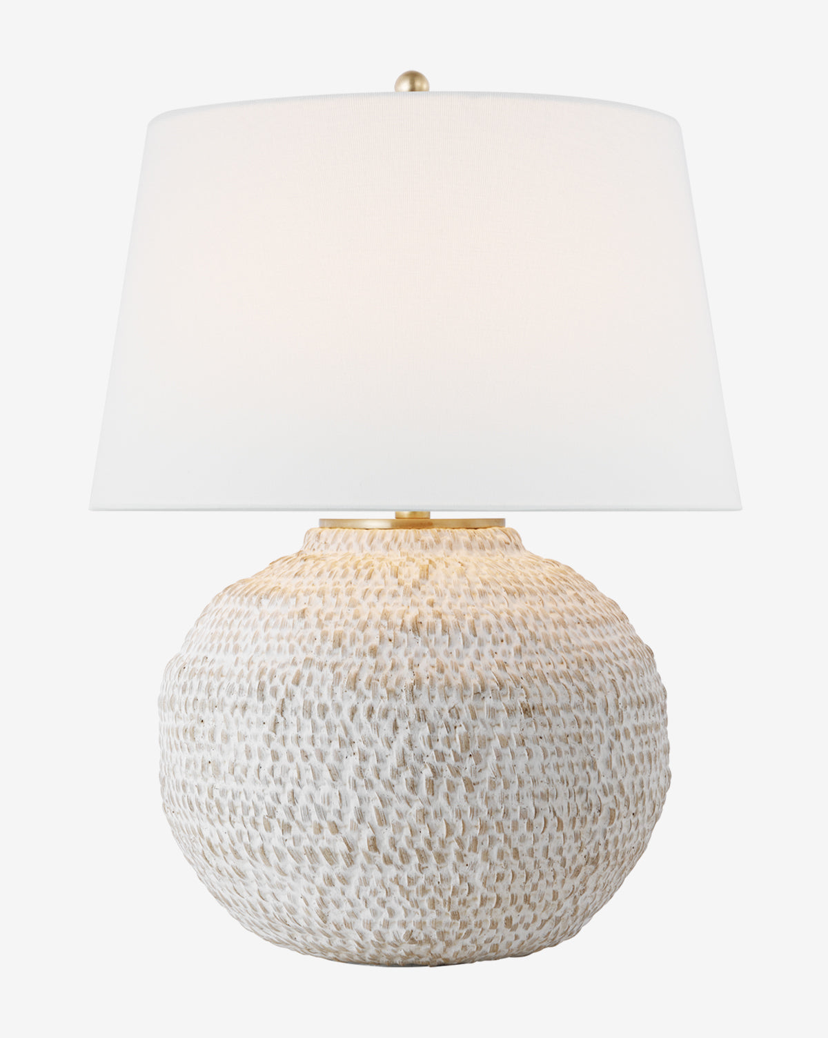 The Avedon Table Lamp boasts a round, textured base with a natural rattan look, complemented by a white linen shade for an elegant, woven-inspired style, by McGee & Co.