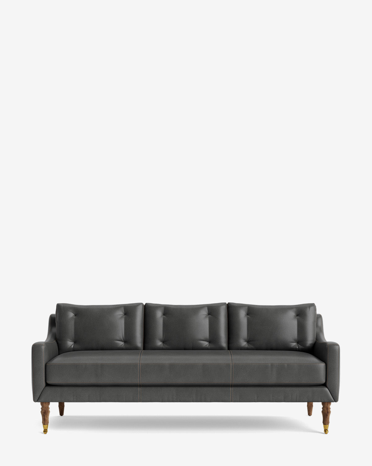 The Barden Sofa 84 is a modern dark grey sofa with three seat and back cushions, elegant reeded wood legs, all displayed against a plain white background by McGee & Co.