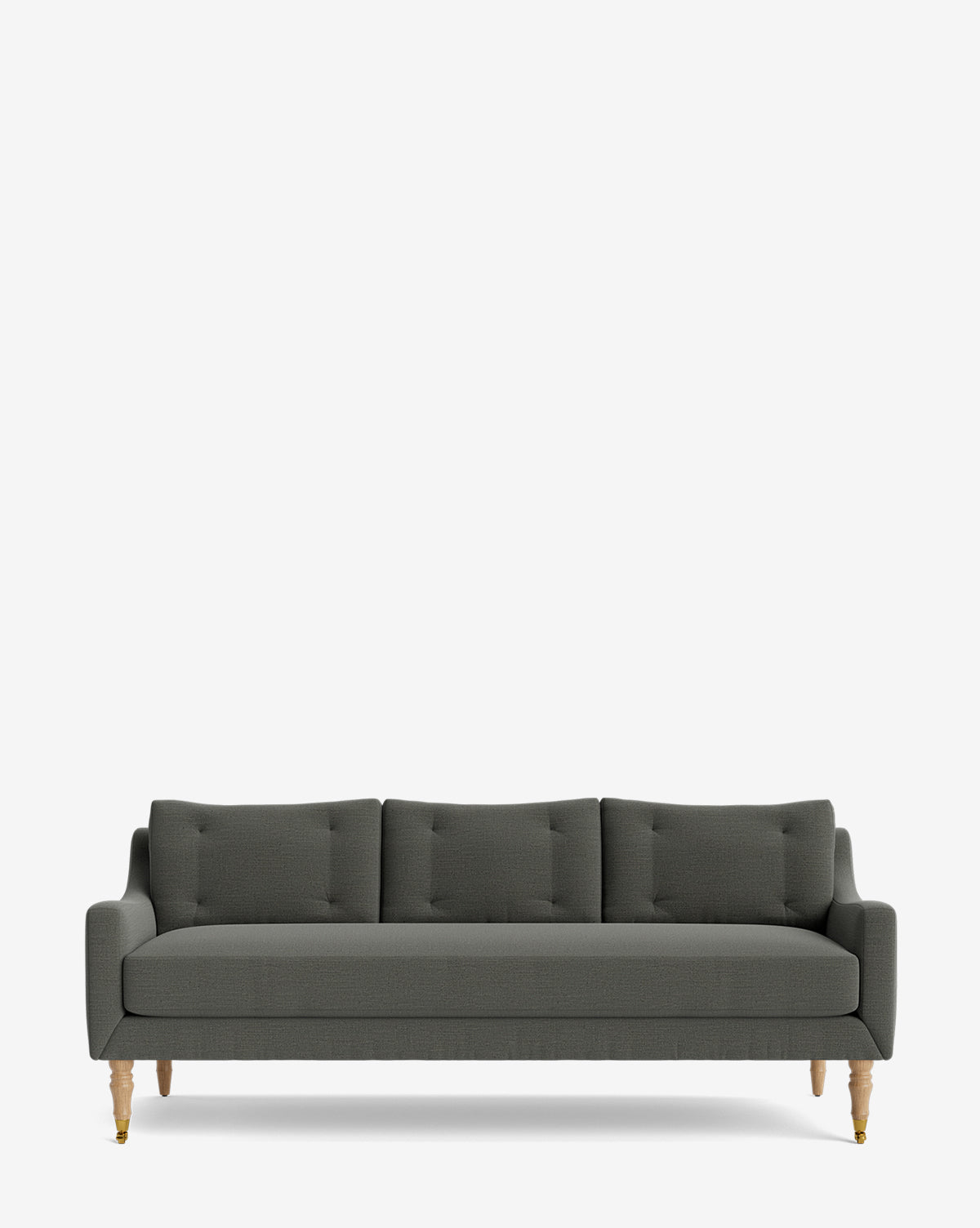The Barden Sofa 84 features dark gray upholstery, tufted cushions, and reeded wood legs. This three-seat sofa with armrests is showcased against a white background for a modern appearance, by McGee & Co.