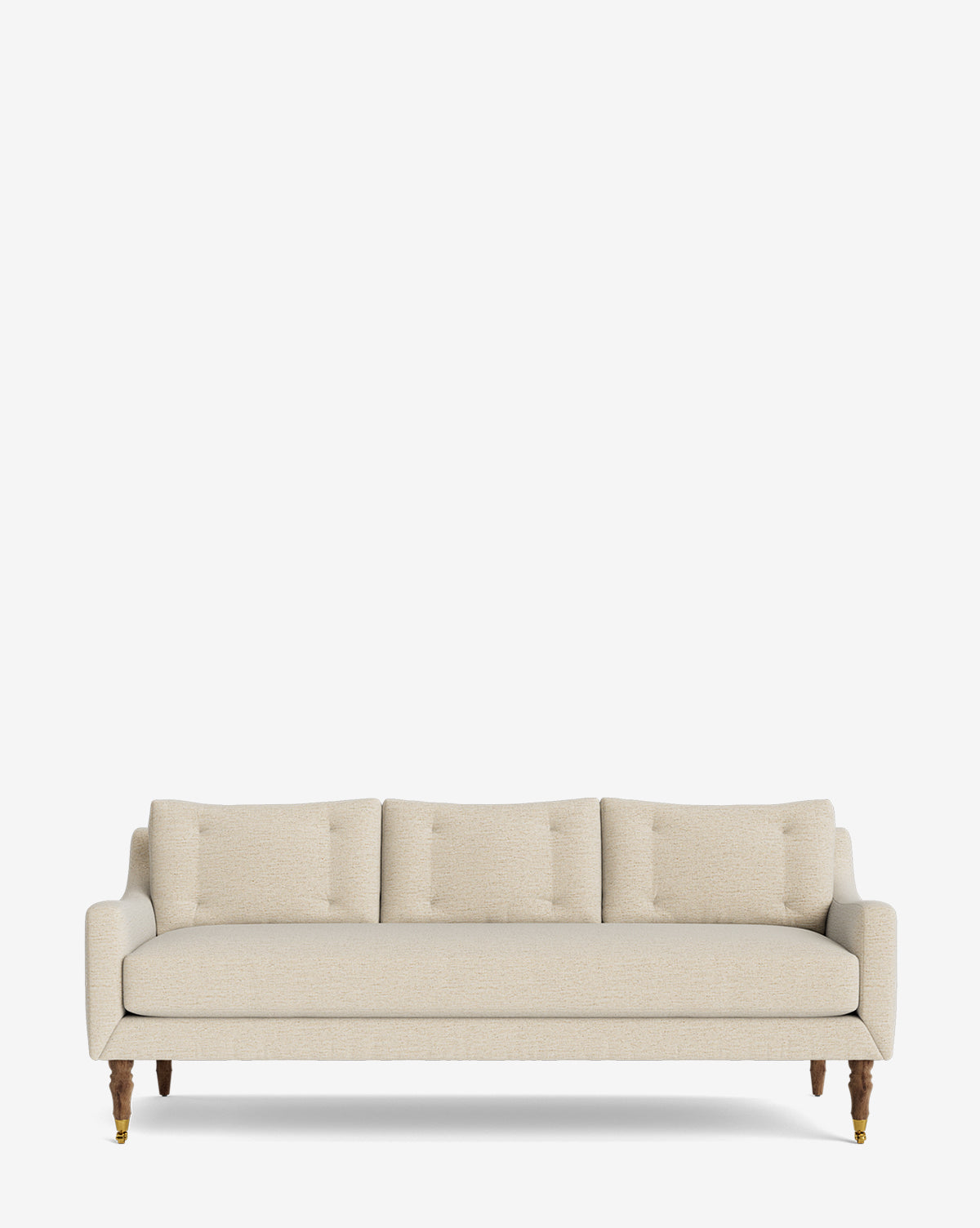 The Barden Sofa 84 showcases beige upholstery, tufted cushions, and elegant reeded wood legs with front brass casters, set against a plain white background by McGee & Co.