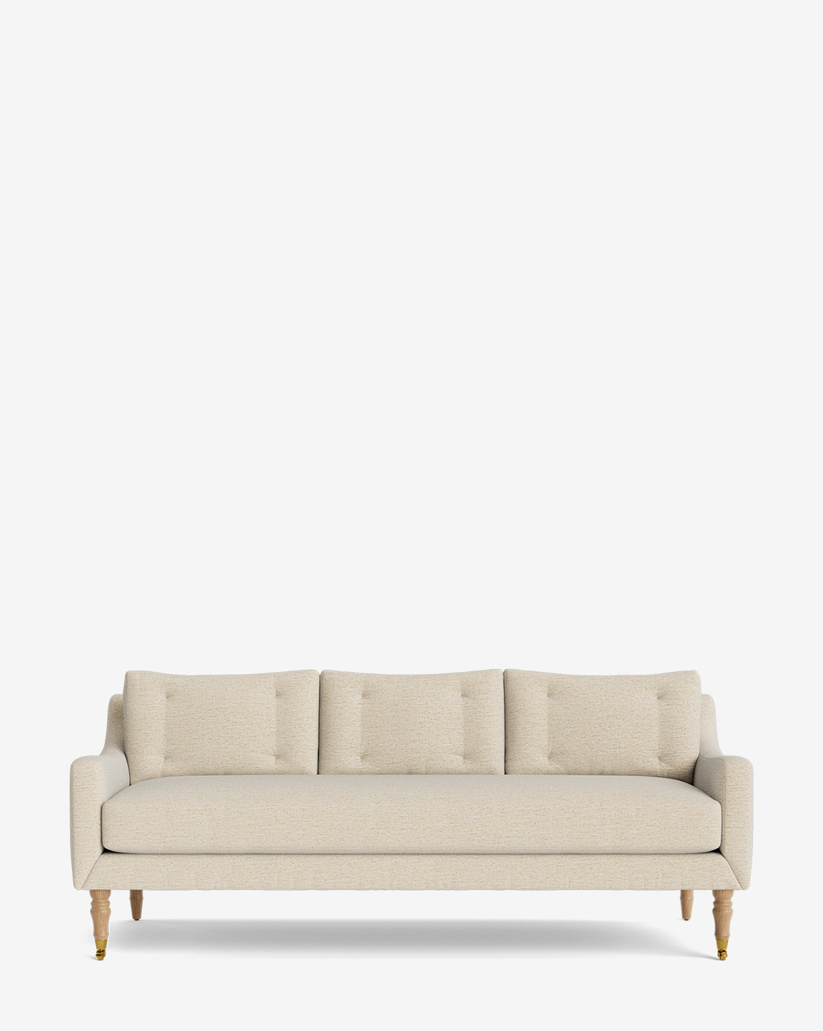 The Barden Sofa 84 is a beige three-seater with tufted cushions and elegant reeded wood legs, featuring a minimalist design against a plain white background by McGee & Co.