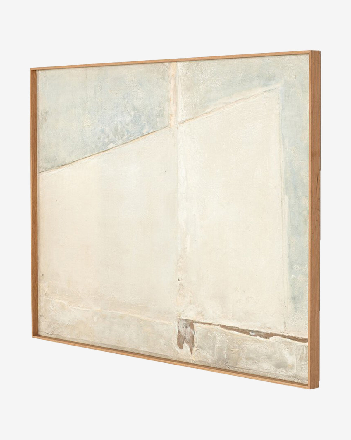 Basalt by Paul Meyer is a minimalist abstract canvas painting with textured off-white and pale blue areas, subtle dividing lines, and a simple wooden frame. Its weathered look evokes calm and simplicity, by McGee & Co.