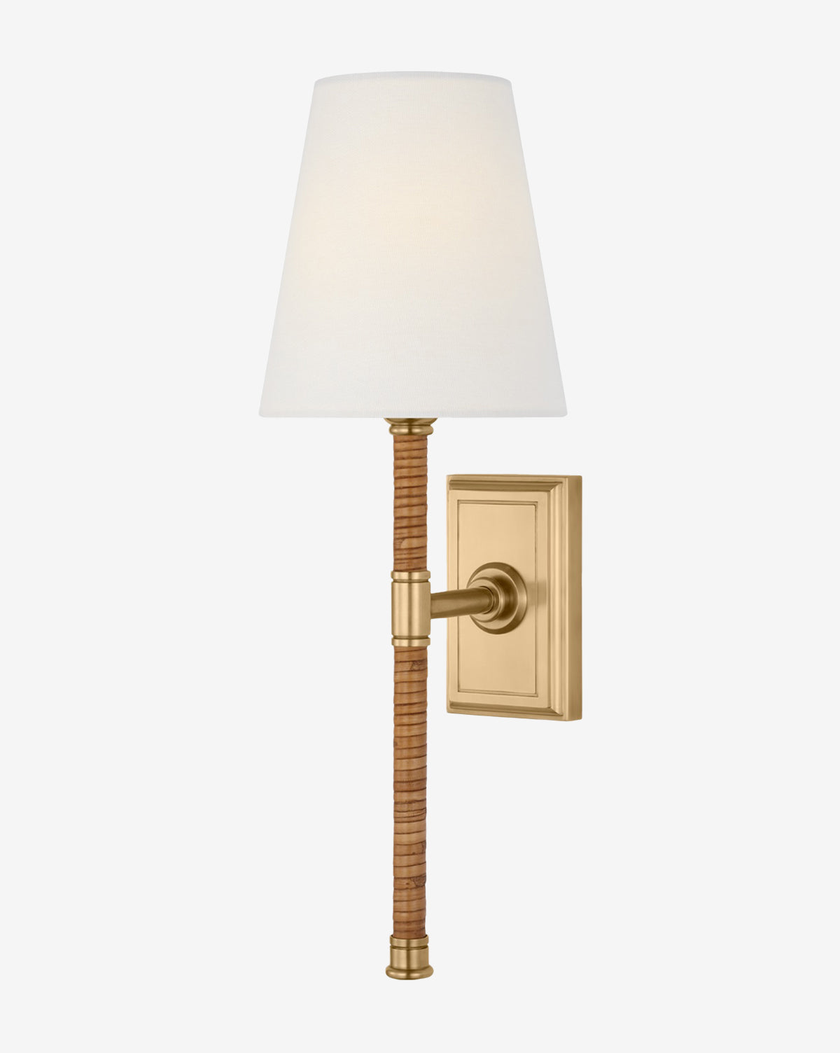 A modern refinement, the Basden Tail Sconce by Visual Comfort & Co. Signature features a gold rattan frame, rectangular backplate, slender brown rattan-wrapped stem, and a white tapered lampshade. McGee & Co.