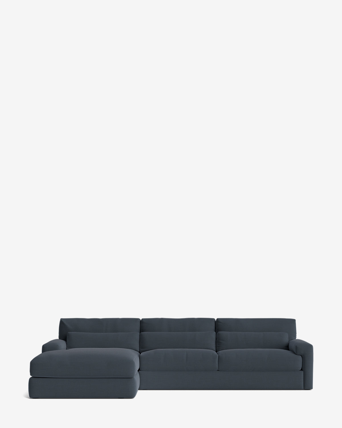 The Community Beckstead Chaise Sectional 128 is a modern, handcrafted dark gray sectional with plush cushions and a minimalist design, featuring a left-facing lounge and shown on a plain white background. McGee & Co.