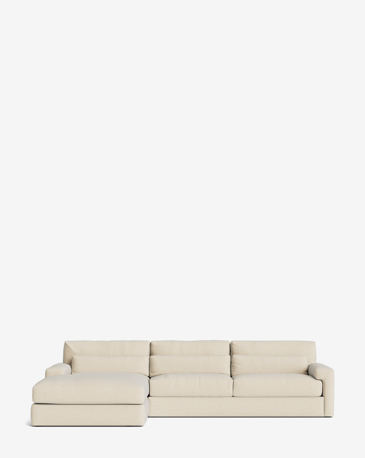 The Beckstead Chaise Sectional 128 by Community features wide cushions, a left-side lounge, and a modern light beige design. Handcrafted for style and comfort, it’s showcased against a simple white background by McGee & Co.