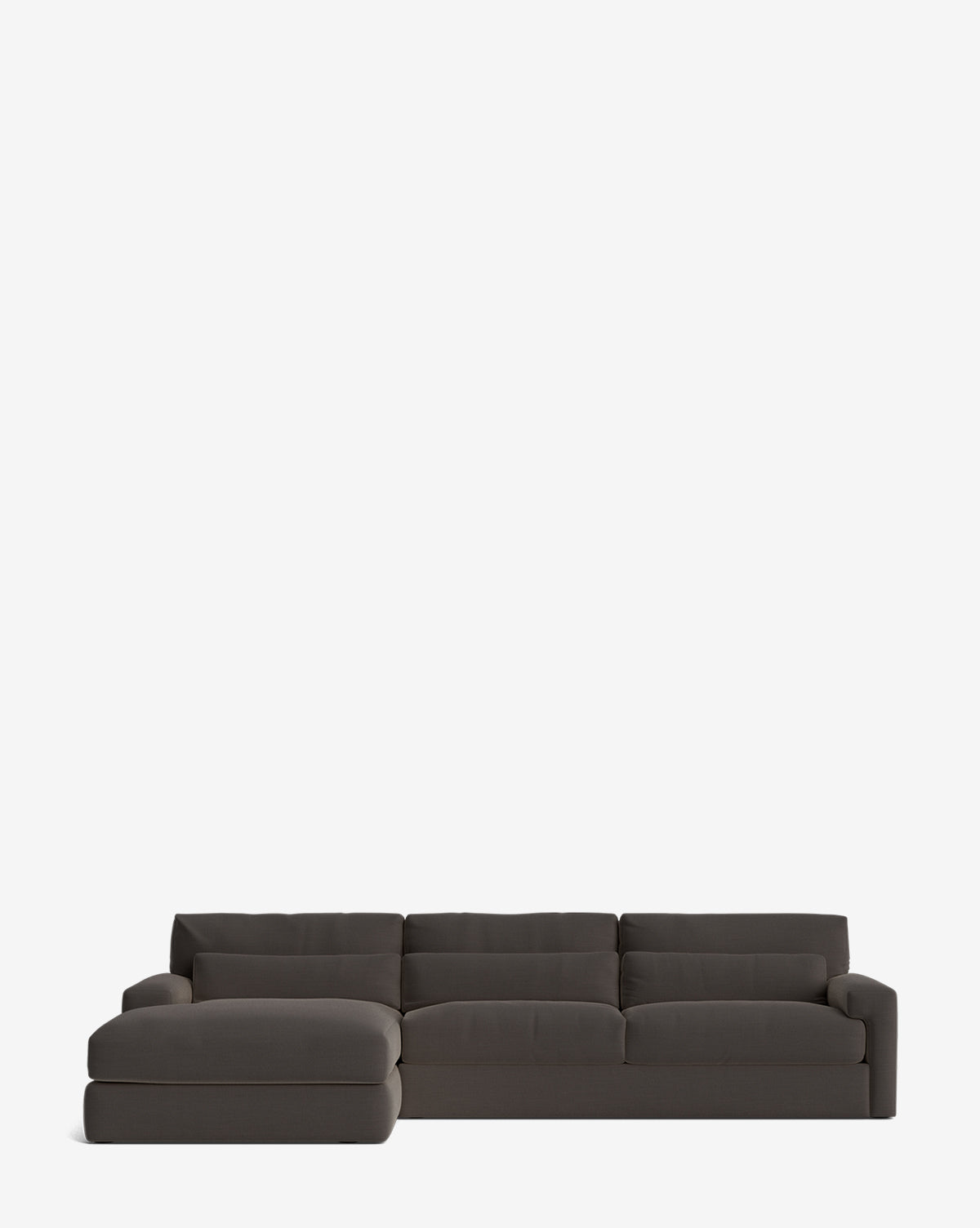 The Beckstead Chaise Sectional 128 by Community features wide, plush cushions and a left-side lounge in modern dark gray, shown against a plain white background. McGee & Co.