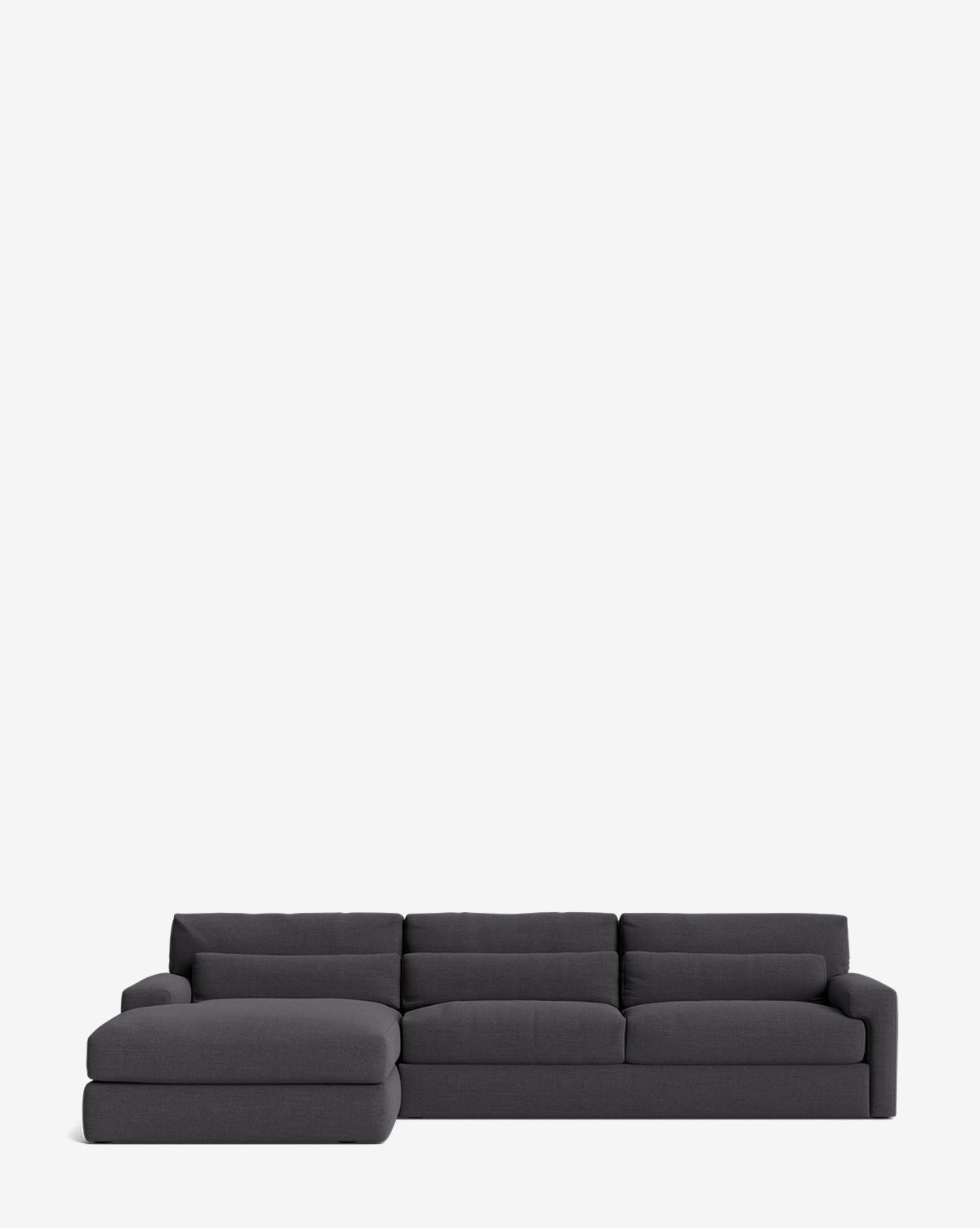 The Beckstead Chaise Sectional 128 by Community features a modern dark gray design with three seat cushions and a left-side lounge, set against a white background—a customizable sofa blending style and comfort for any home. McGee & Co.