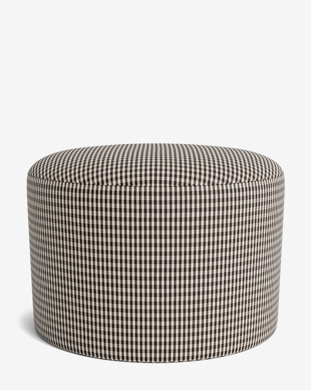 The Makerspalm Bellamy Ottoman is a round, customizable ottoman in black and white gingham check fabric, shown on a plain white background. McGee & Co.