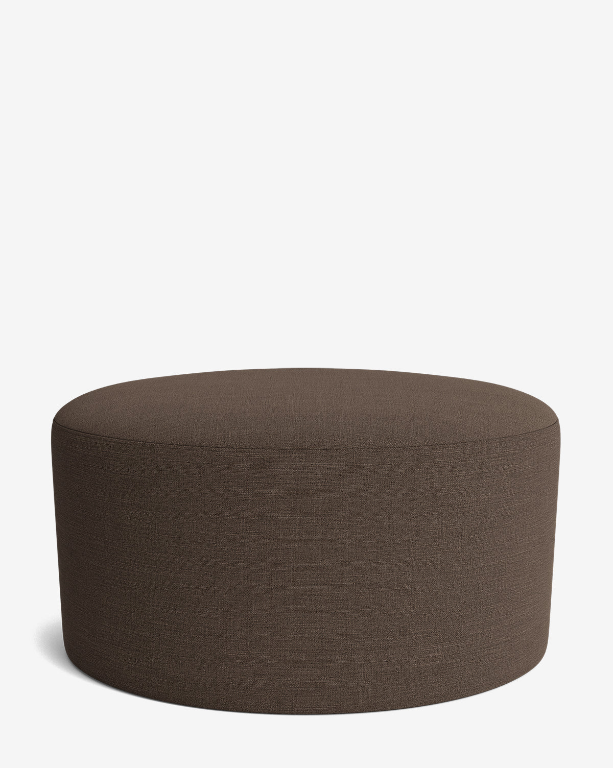 The Makerspalm Bellamy Ottoman is large, round, and brown with a smooth surface, shown on a plain white background—a versatile piece for any space. McGee & Co.