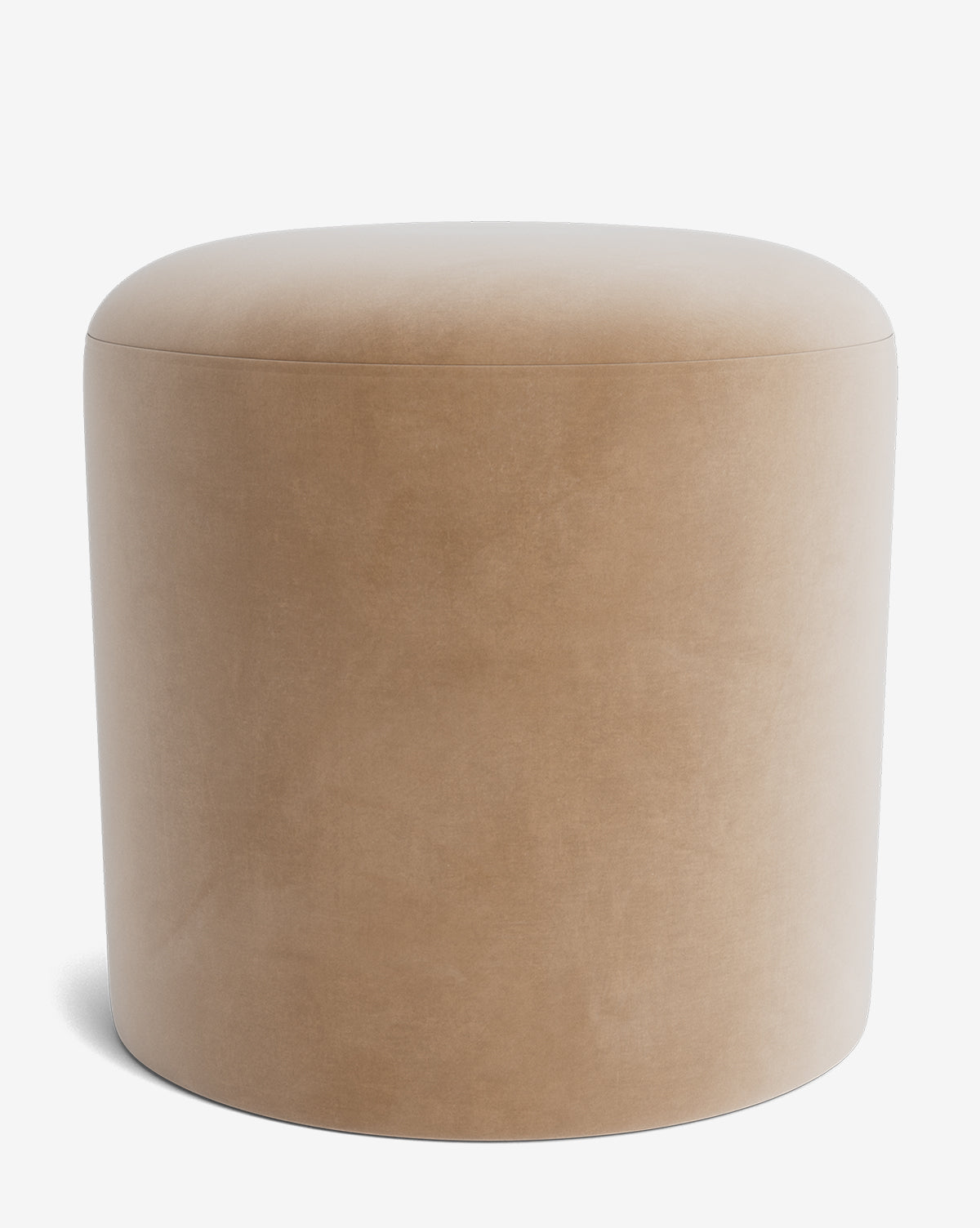 The Makerspalm Bellamy Ottoman is a round, beige piece with a smooth velvet texture and minimalist design—an ideal, versatile ottoman for any modern space. McGee & Co.