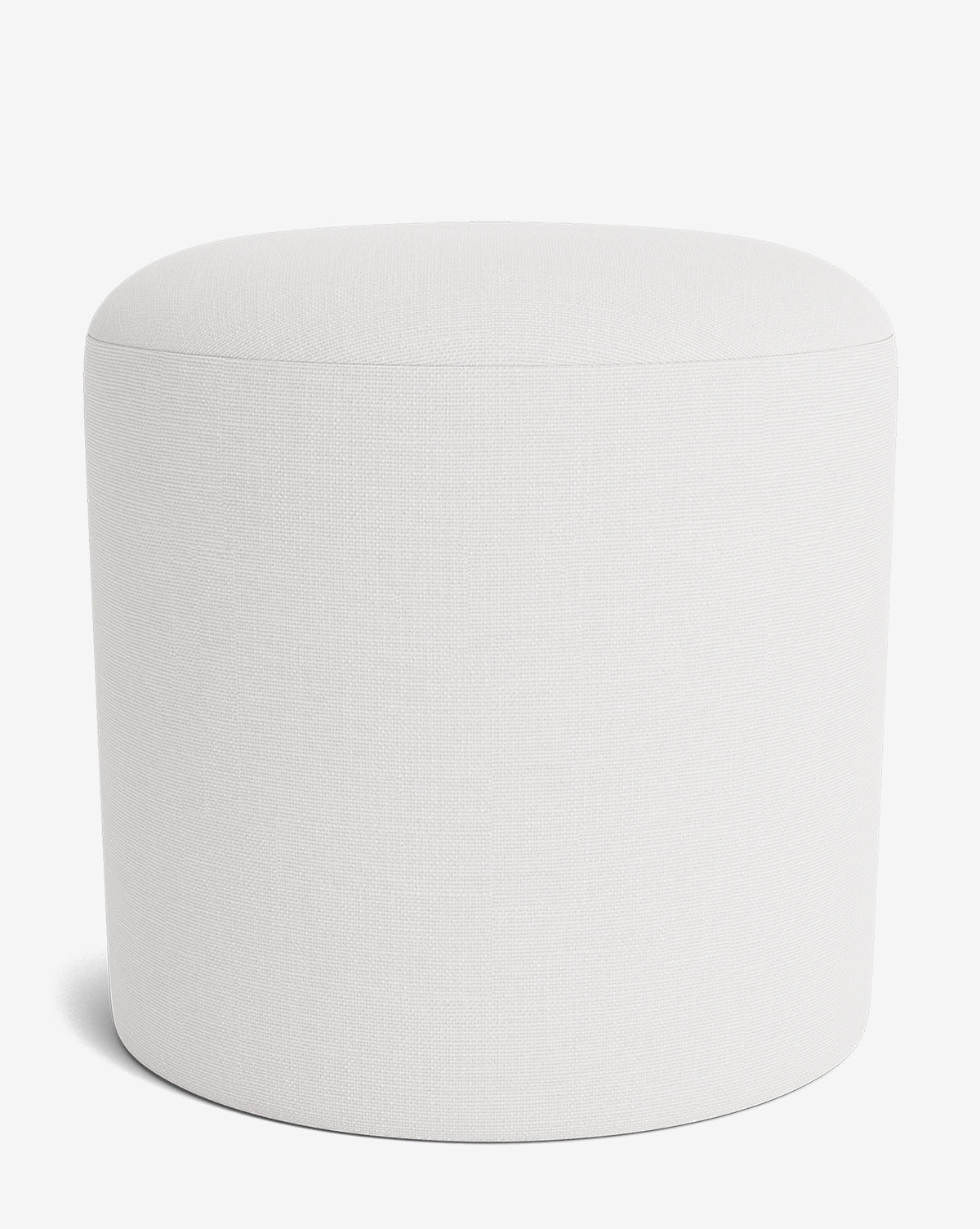 The Makerspalm Bellamy Ottoman is a simple, modern, round piece with smooth sides and a flat top, upholstered in plain white fabric—an effortlessly versatile choice for any space. McGee & Co.