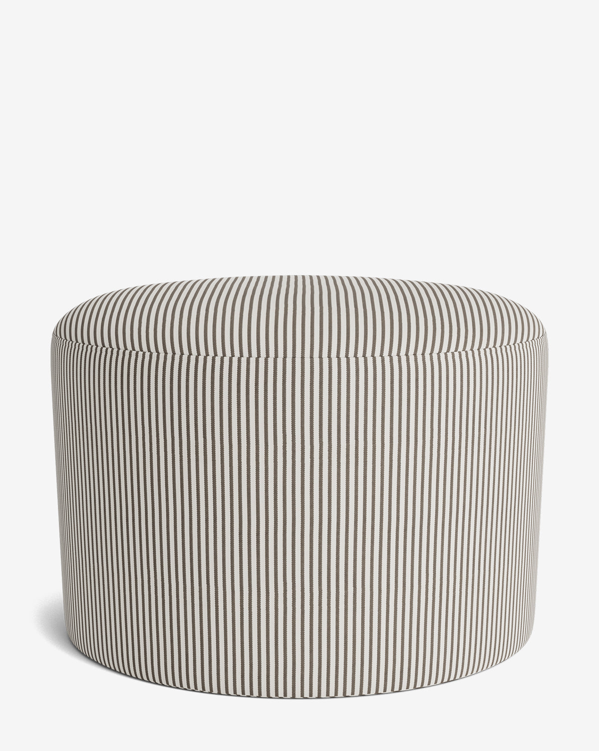 The Makerspalm Bellamy Ottoman is a round, versatile piece upholstered in black and white striped fabric on a plain white background by McGee & Co.