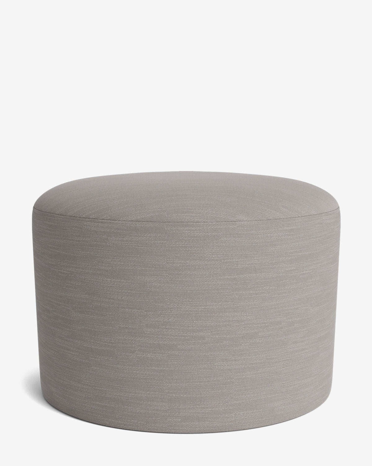 The Makerspalm Bellamy Ottoman is a round, light gray fabric ottoman with a smooth, seamless surface, shown on a plain white background—a versatile piece for any space. McGee & Co.