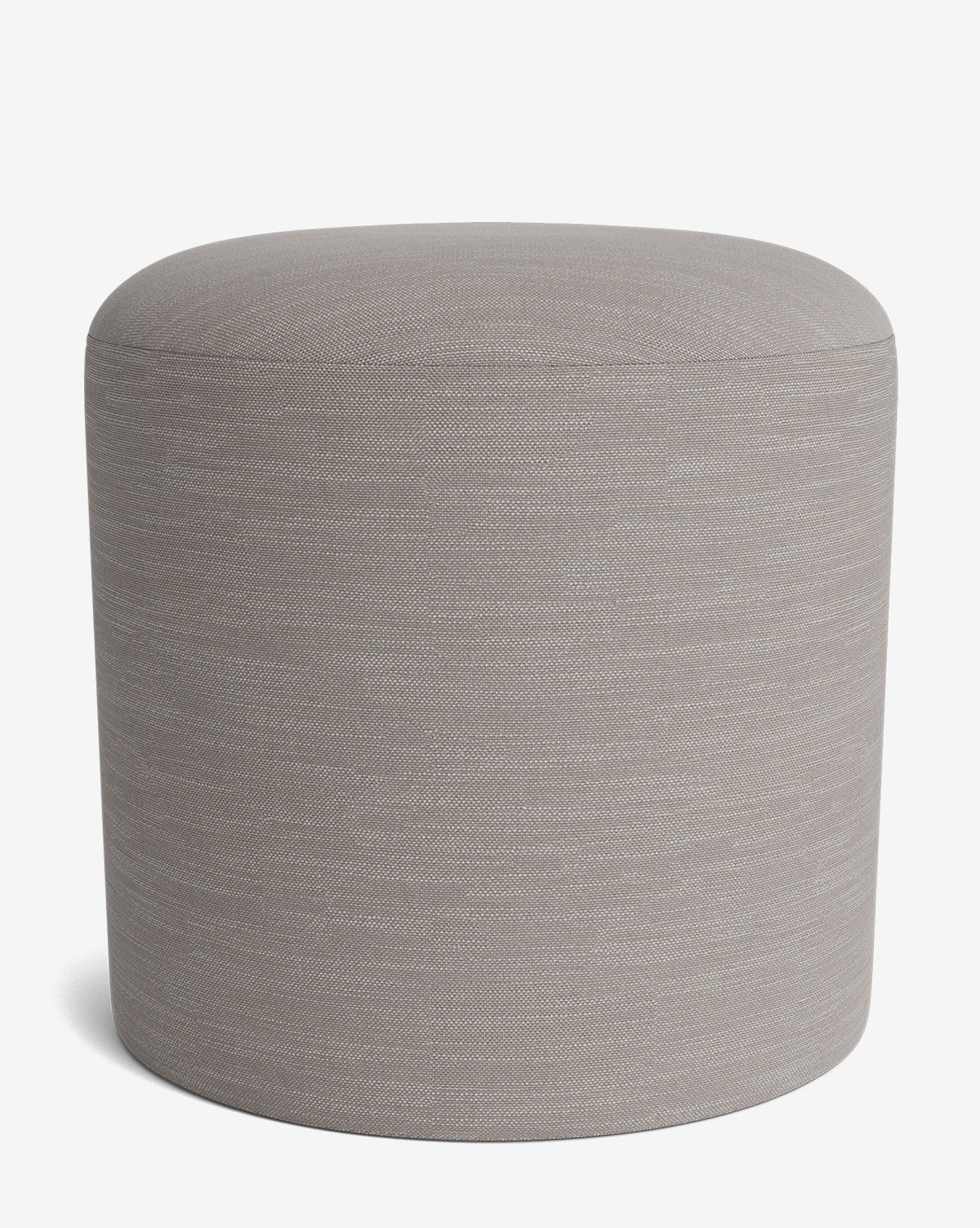 The Makerspalm Bellamy Ottoman is a round, light gray fabric piece with no visible legs, shown on a plain white background—an elegant and versatile addition to any living space from McGee & Co.
