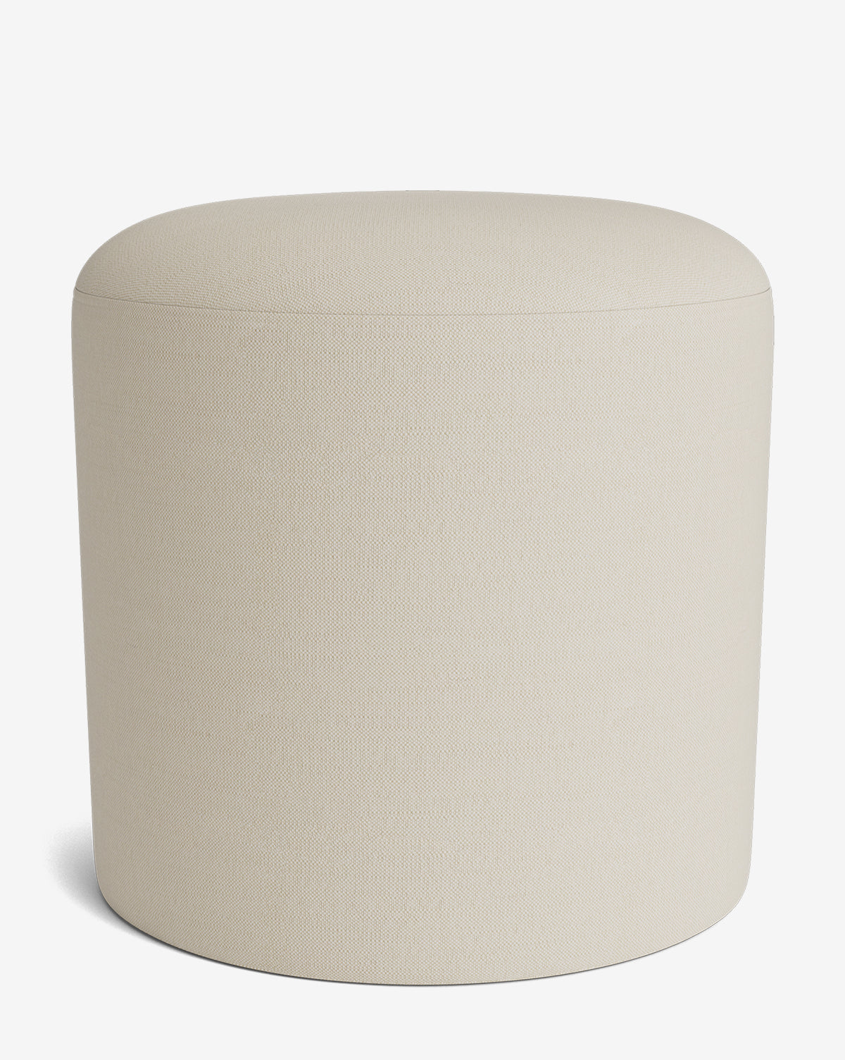 The Makerspalm Bellamy Ottoman is a beige, cylindrical upholstered piece with a smooth, rounded top and minimalist design, perfect for complementing any modern interior. McGee & Co.
