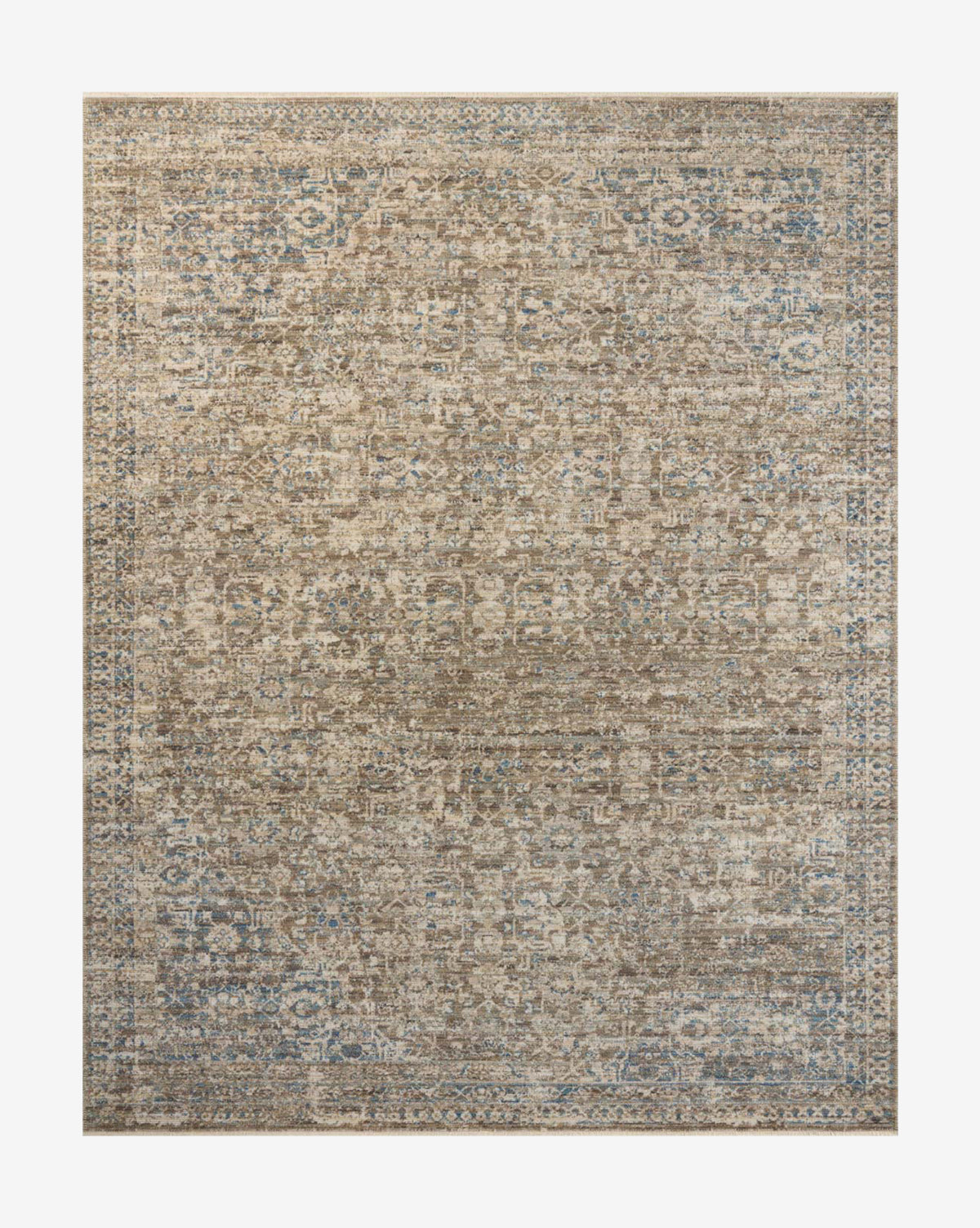 The Benito Rug is a rectangular area rug with an intricate motif and a faded vintage pattern in muted beige, brown, and blue tones for an antique, distressed look, by McGee & Co.