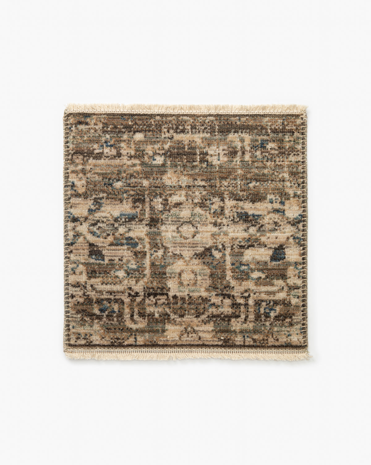 Square swatch of the Benito Neutral Rug features a vintage, distressed look with muted brown, beige, and blue tones in an intricate motif. High-quality construction is finished with short beige fringe along the edges, by McGee & Co.